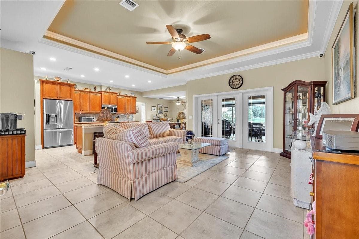 Single Family Residence at 11614 SW COURTLY MANOR DR, LAKE SUZY, photo 4 of 49