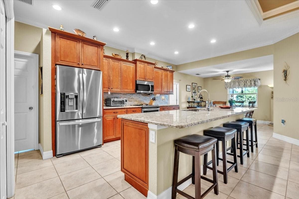 Single Family Residence at 11614 SW COURTLY MANOR DR, LAKE SUZY, photo 8 of 49