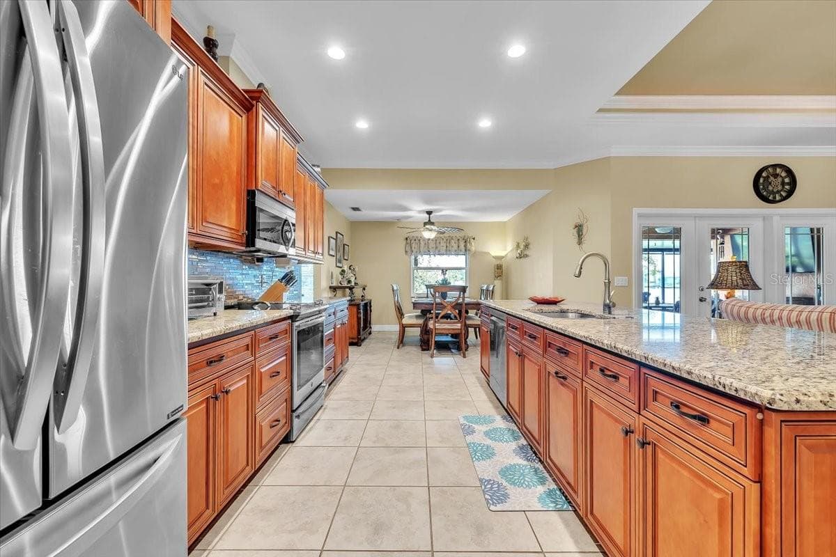 Single Family Residence at 11614 SW COURTLY MANOR DR, LAKE SUZY, photo 11 of 49