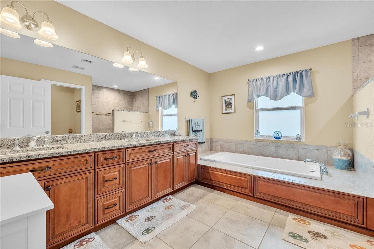 Single Family Residence at 11614 SW COURTLY MANOR DR, LAKE SUZY, photo 19 of 49