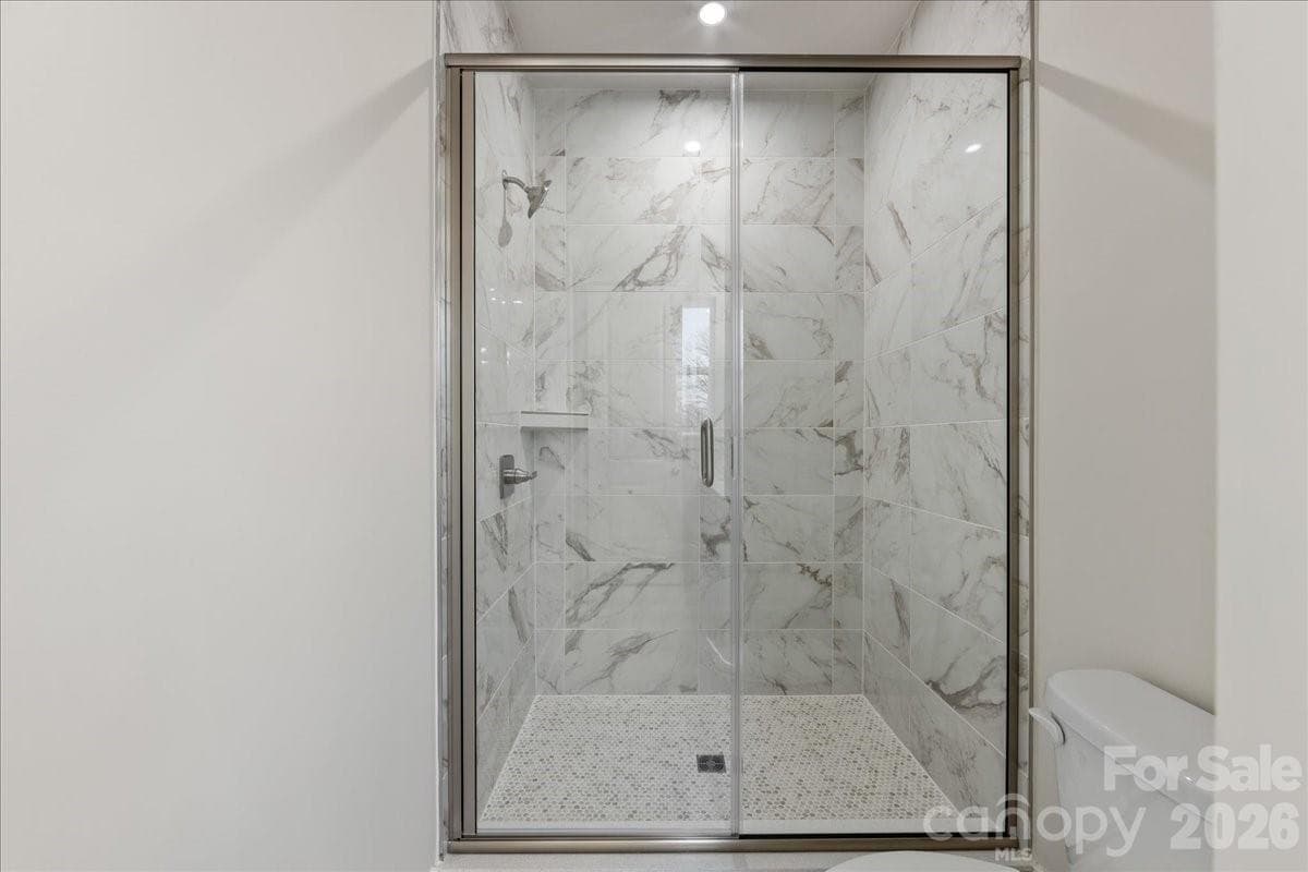 Tiled primary walk-in shower - Charlotte