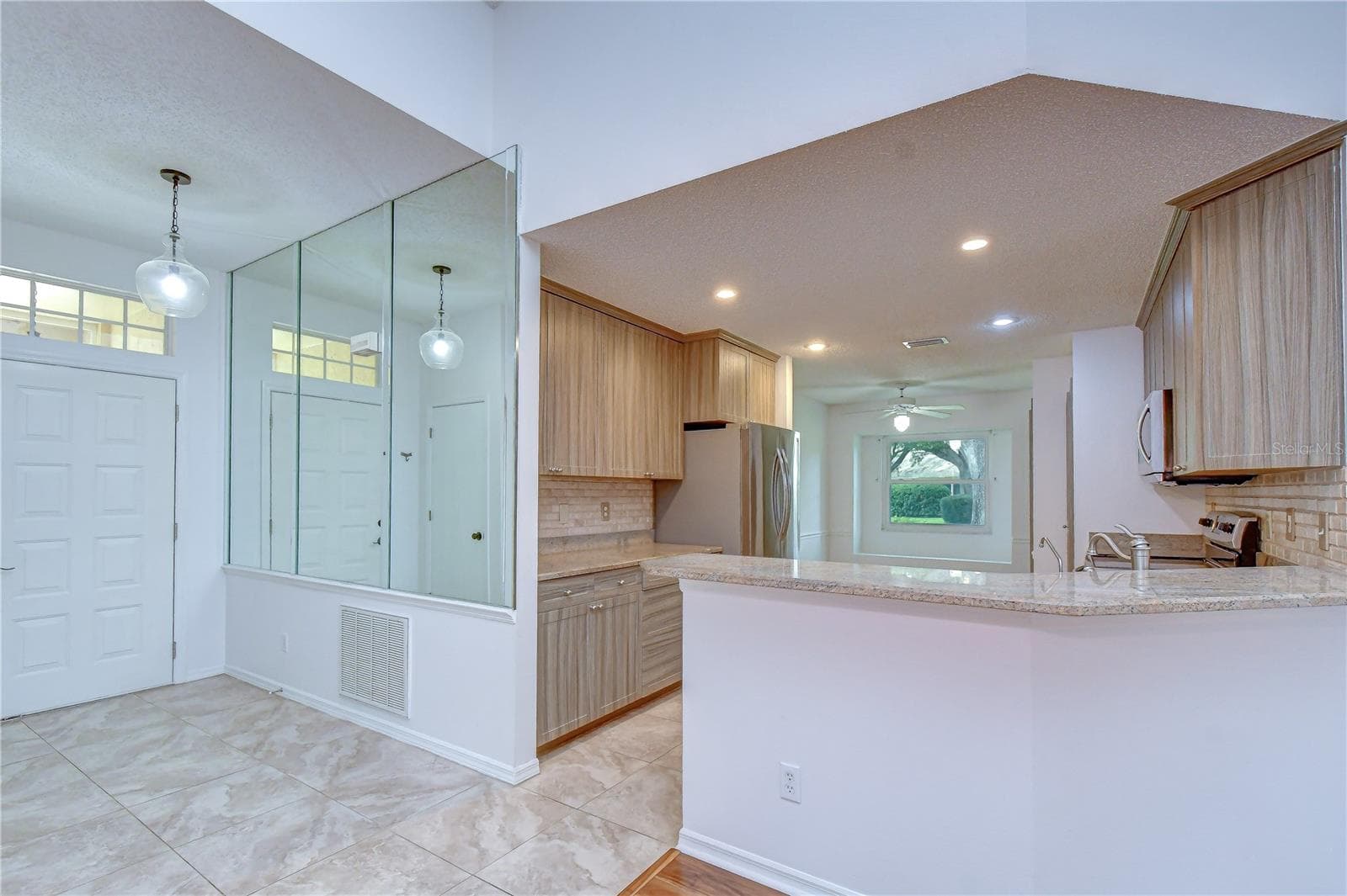 Beautifully appointed kitchen designed for both function and style. - 818 MCCALLISTER AVE, SUN CITY CENTER