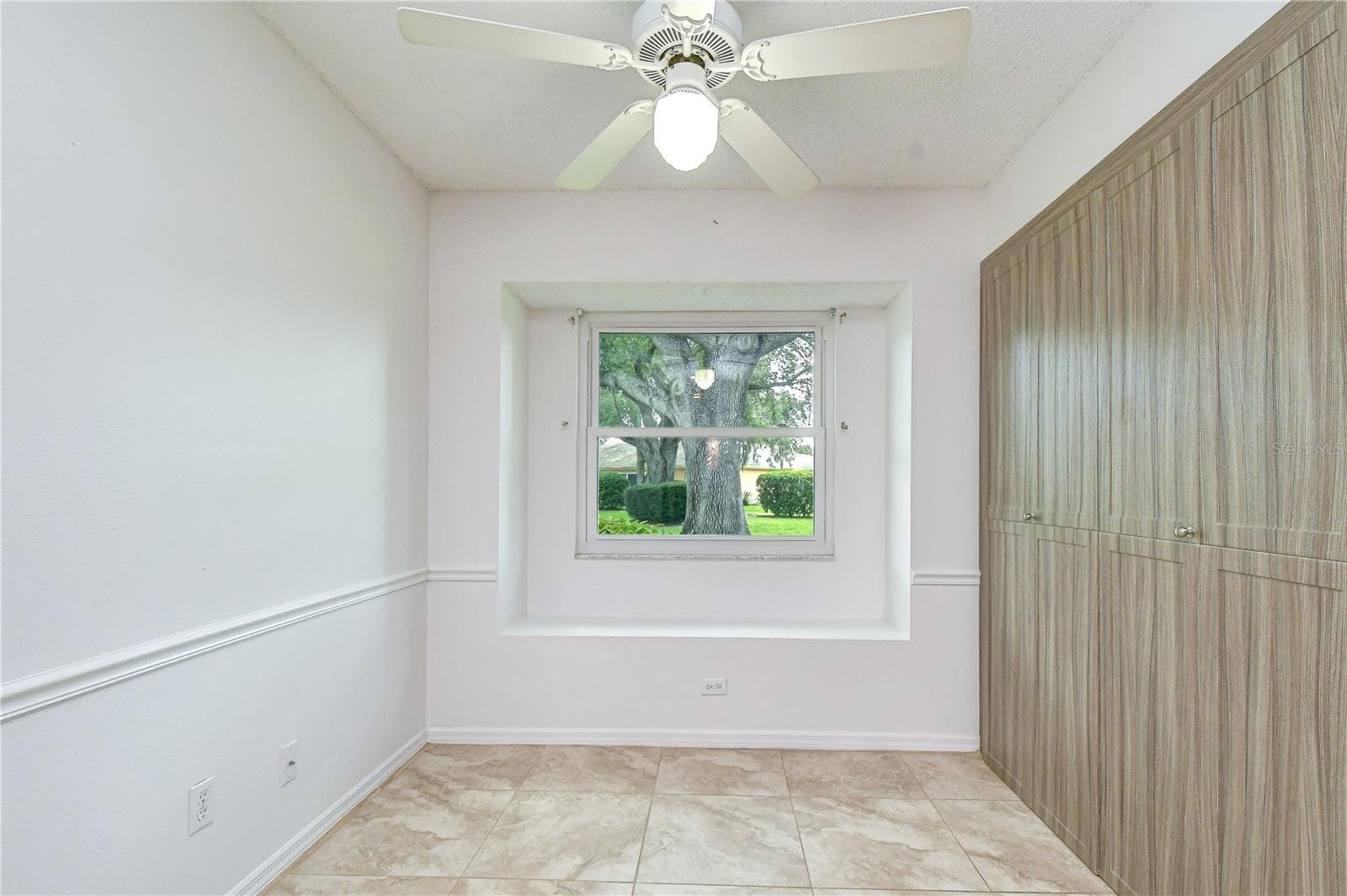 Cozy dining area perfect for casual meals. - 818 MCCALLISTER AVE, SUN CITY CENTER
