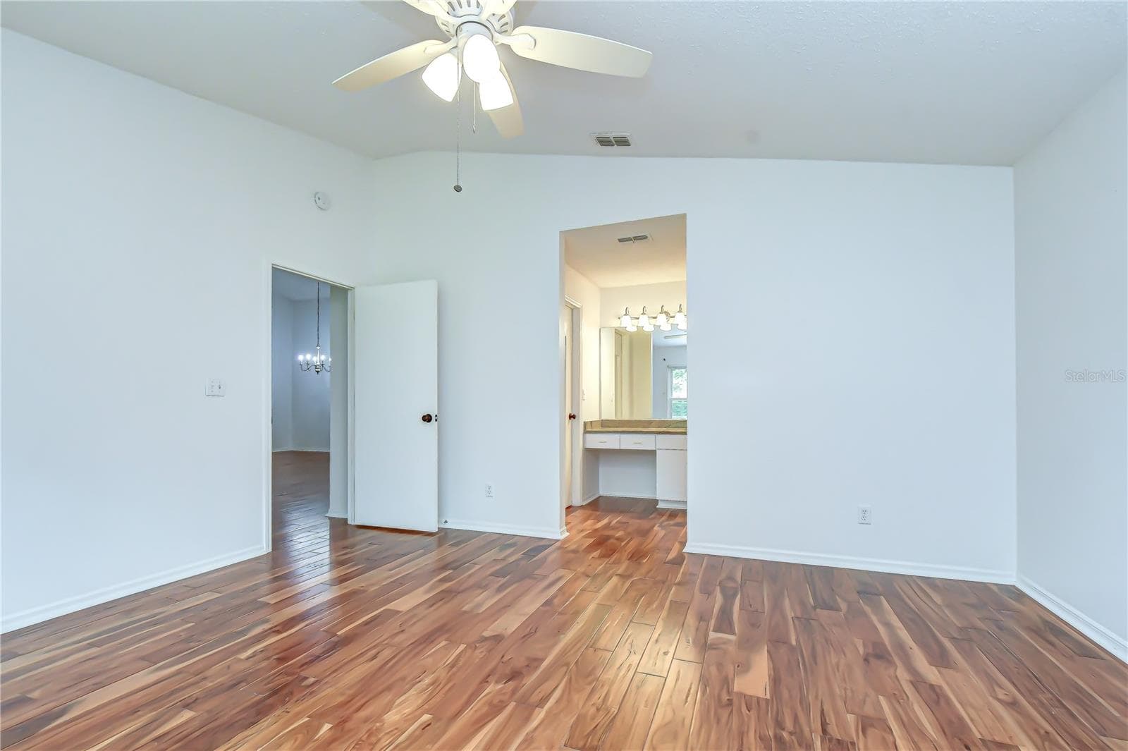 Beautiful hardwood flooring throughout living areas and bedrooms. - 818 MCCALLISTER AVE, SUN CITY CENTER