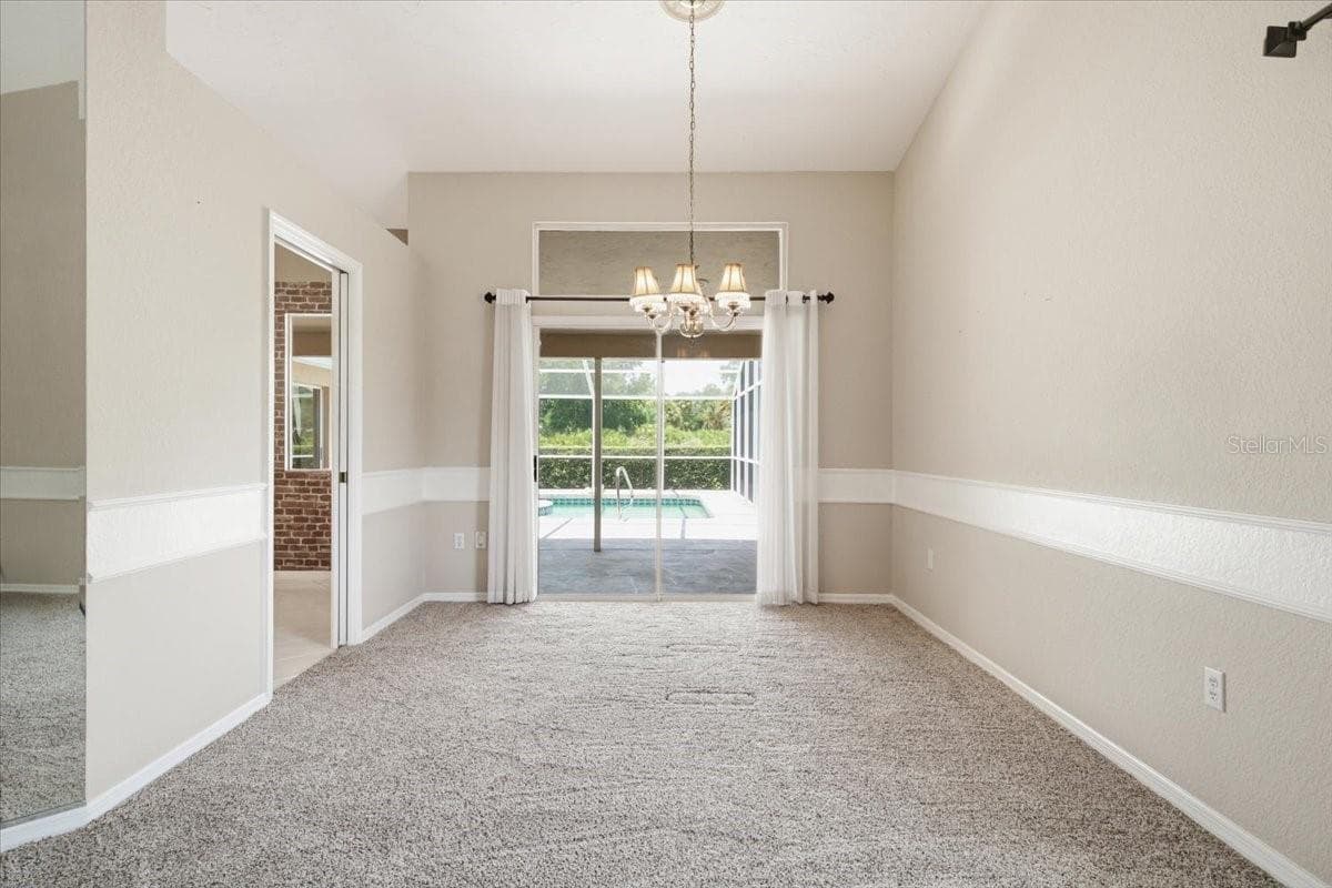Dining room sliders to lanai - 7015 PLEASANT HILL RD, BRADENTON