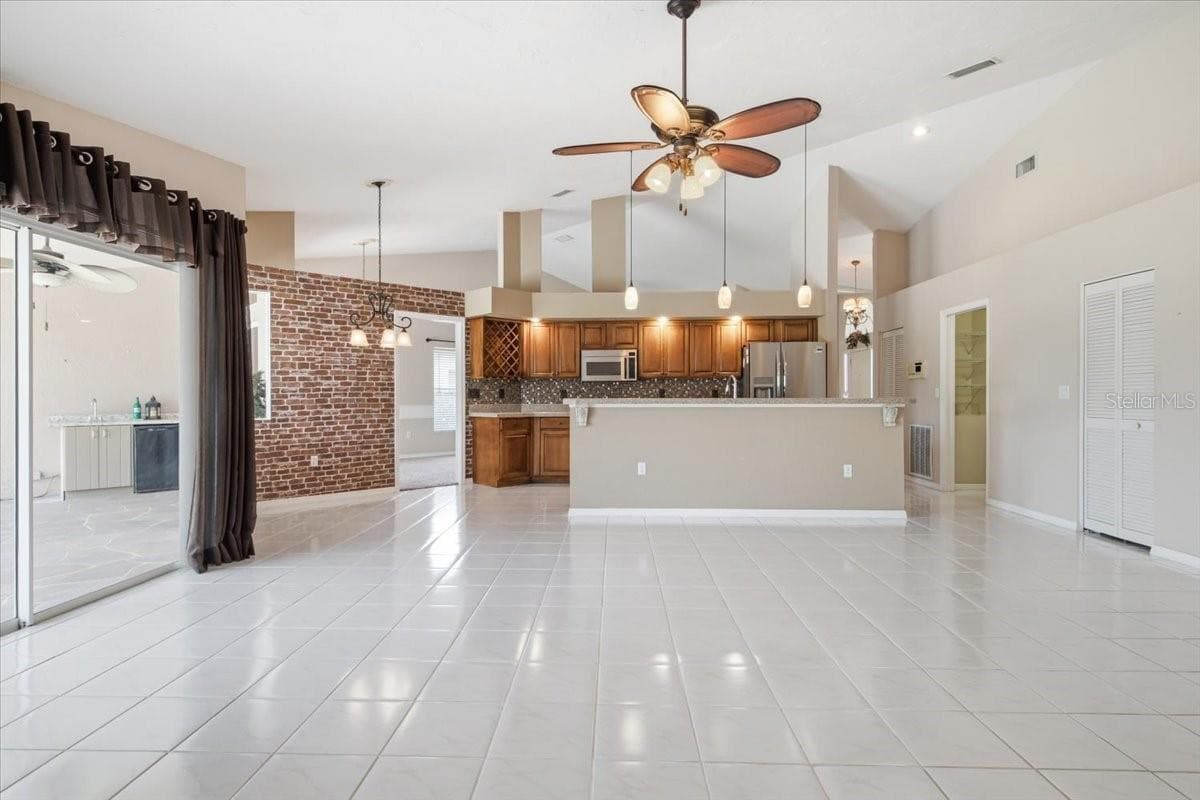 Another view from Den into kitchen - 7015 PLEASANT HILL RD, BRADENTON