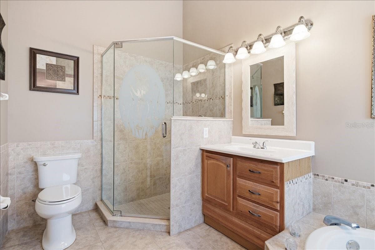 Separate sinks with garden tub between, and separate shower - 7015 PLEASANT HILL RD, BRADENTON