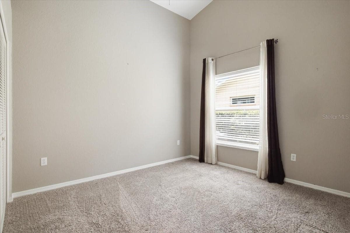 Bedroom two has pocket door to both bedroom and bath two for privacy - 7015 PLEASANT HILL RD, BRADENTON