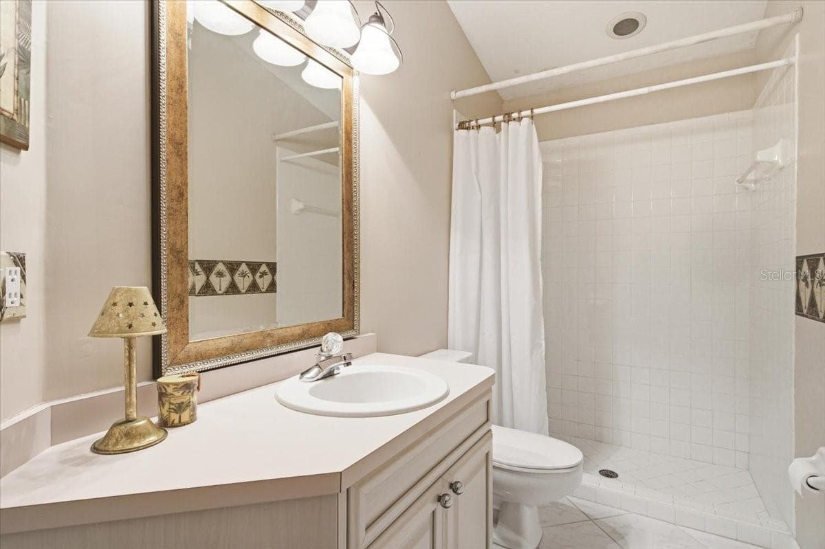 Bathroom three on opposite side of home - 7015 PLEASANT HILL RD, BRADENTON