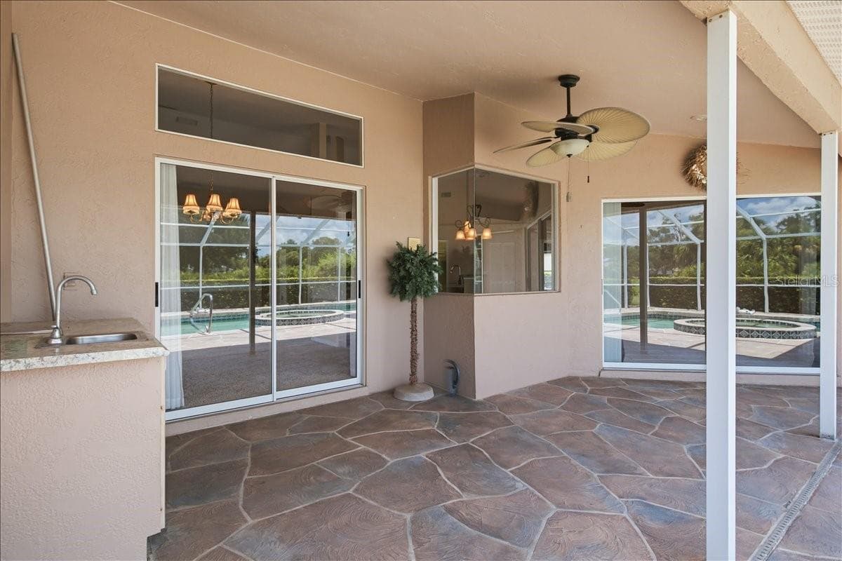 Opposite view of covered lanai spaces - 7015 PLEASANT HILL RD, BRADENTON