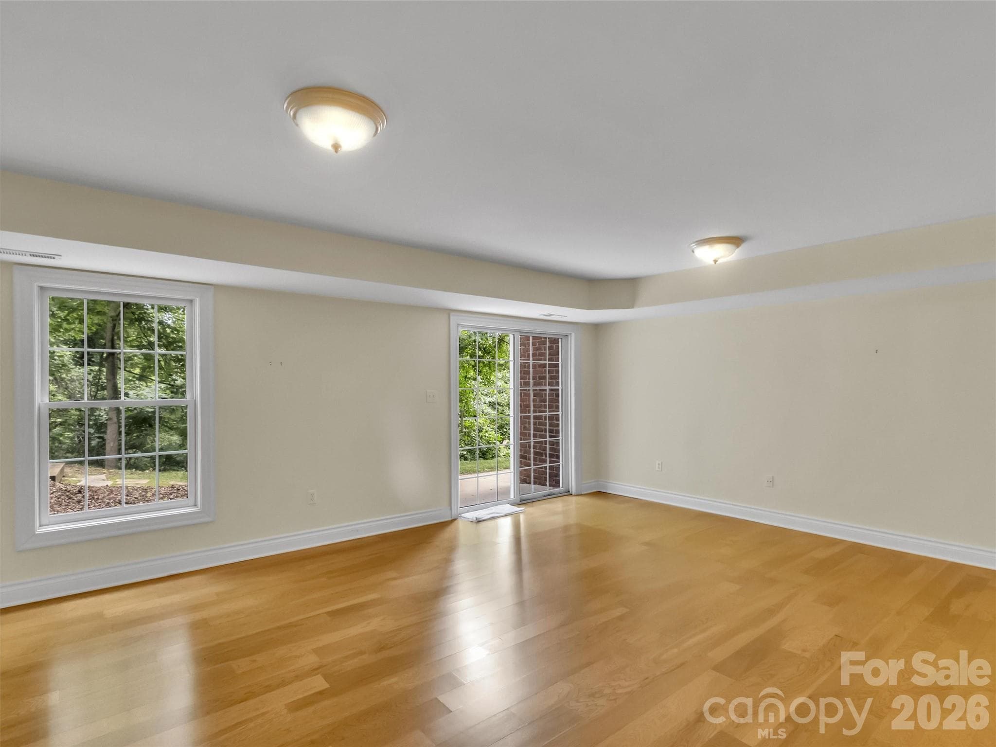 lower level, gathering room/ outdoor access - 9 Hickory Ridge, Fletcher