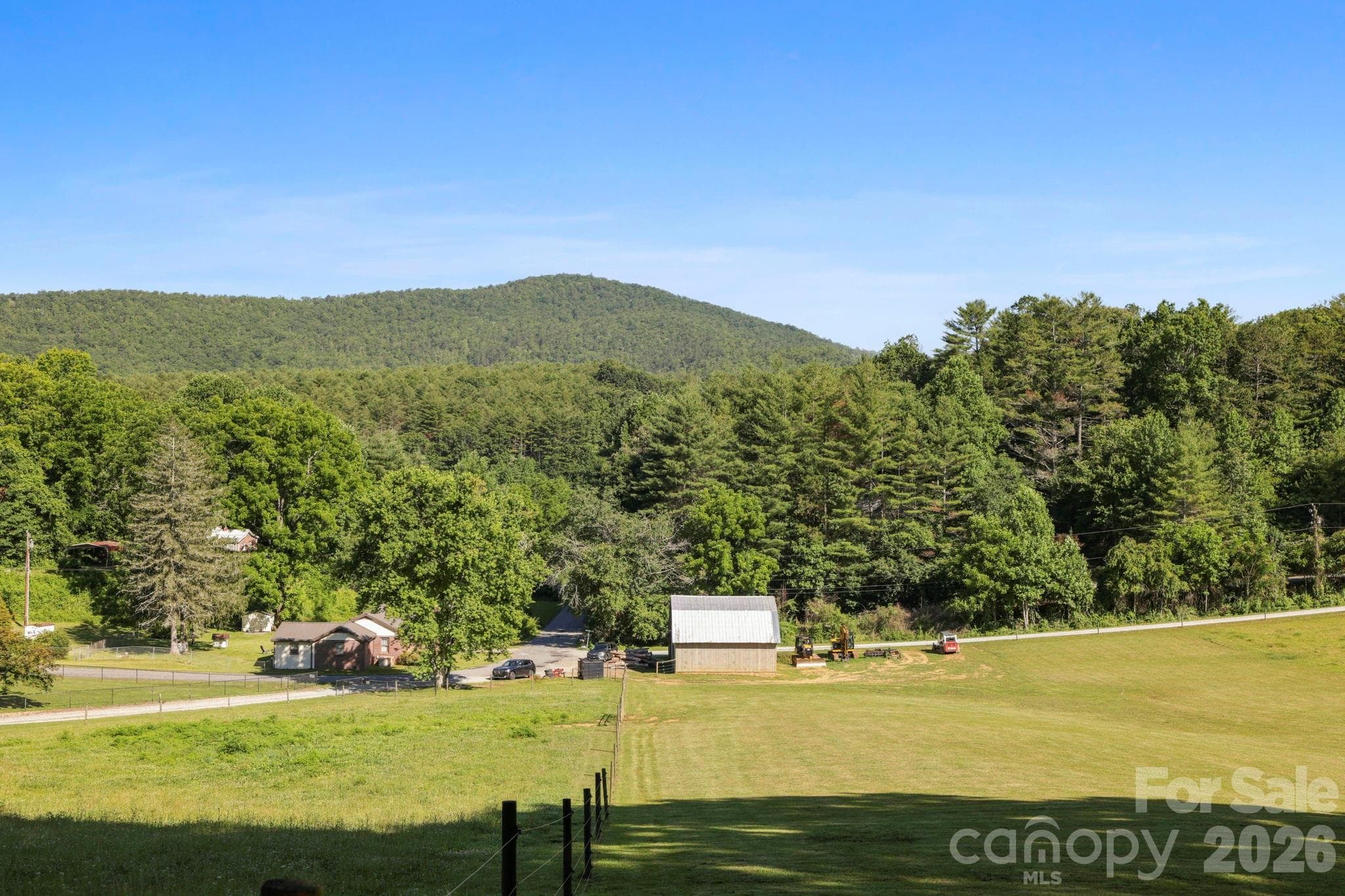 Imagine watching beautiful sunsets in the valley right from your front porch. - Pisgah Forest