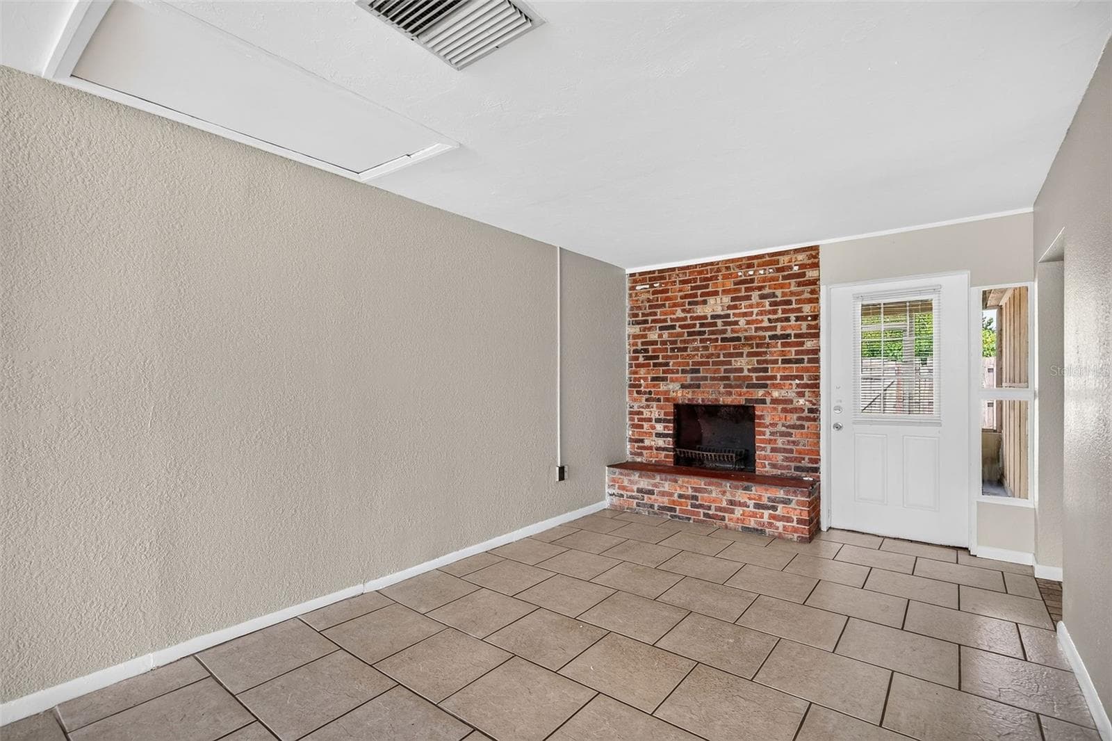 Unit 708 Living Room/Dining Area - 708 N SAINT CLAIR ABRAMS AVE, TAVARES