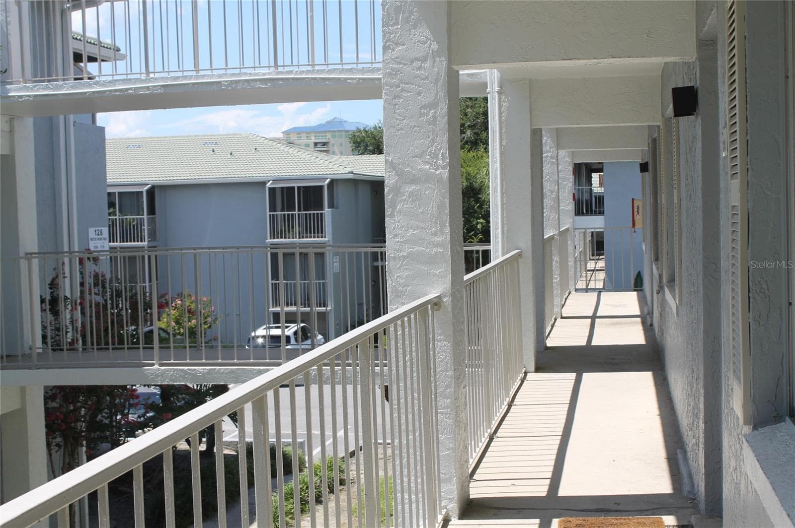Covered walk way stairs to unit - 151 OYSTER BAY CIR #200, ALTAMONTE SPRINGS