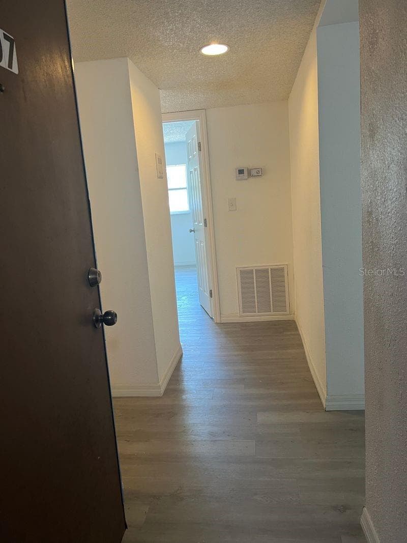 Condominium at 5541 BAY BLVD #107, PORT RICHEY, photo 15 of 26