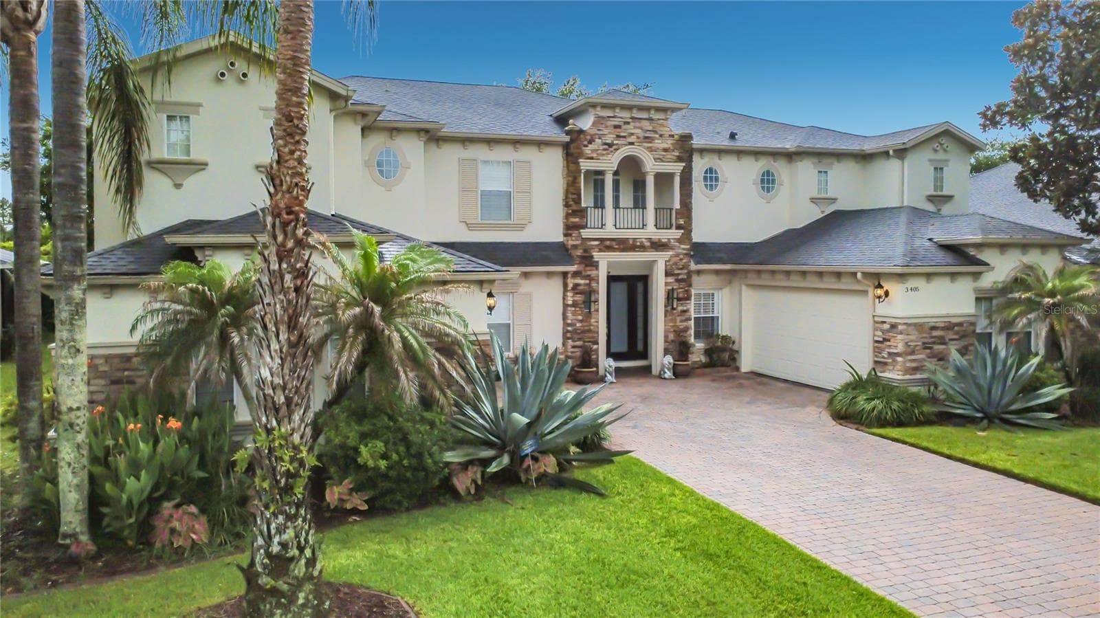 Spectacular 6 Bed/4.5 Bath, 4332 sf home with two 2-car garages in The Sanctuary. - 3405 HEIRLOOM ROSE PL, OVIEDO