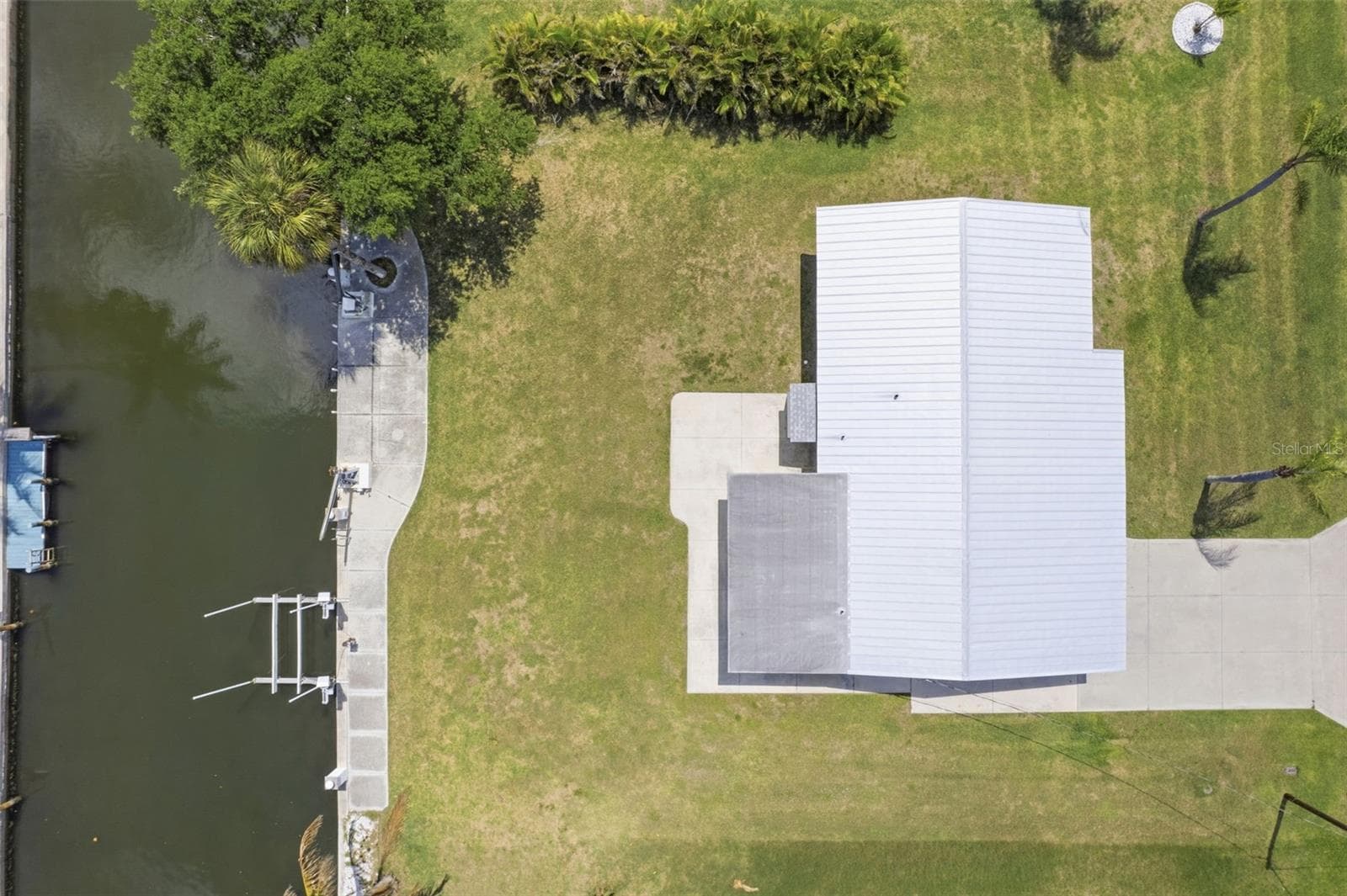 Overhead of home and saltwater canal and boat lift. - 10451 MARION ST, ENGLEWOOD