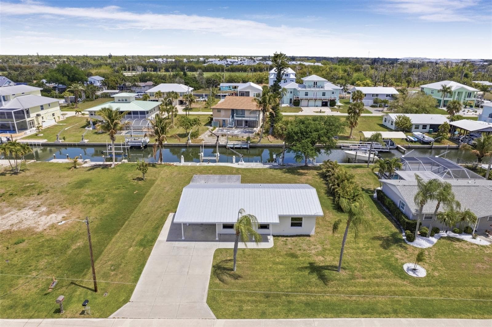 Overhead view of home and canal facing East - 10451 MARION ST, ENGLEWOOD