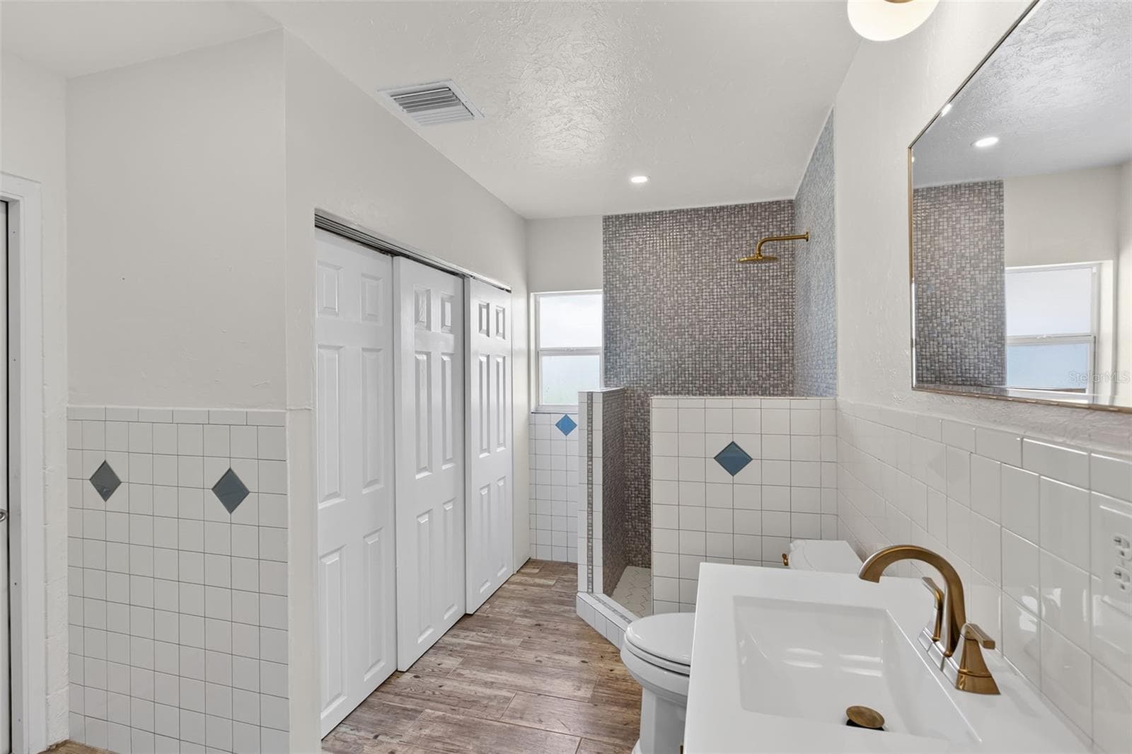 Laundry closet in bathroom near kitchen - 10451 MARION ST, ENGLEWOOD
