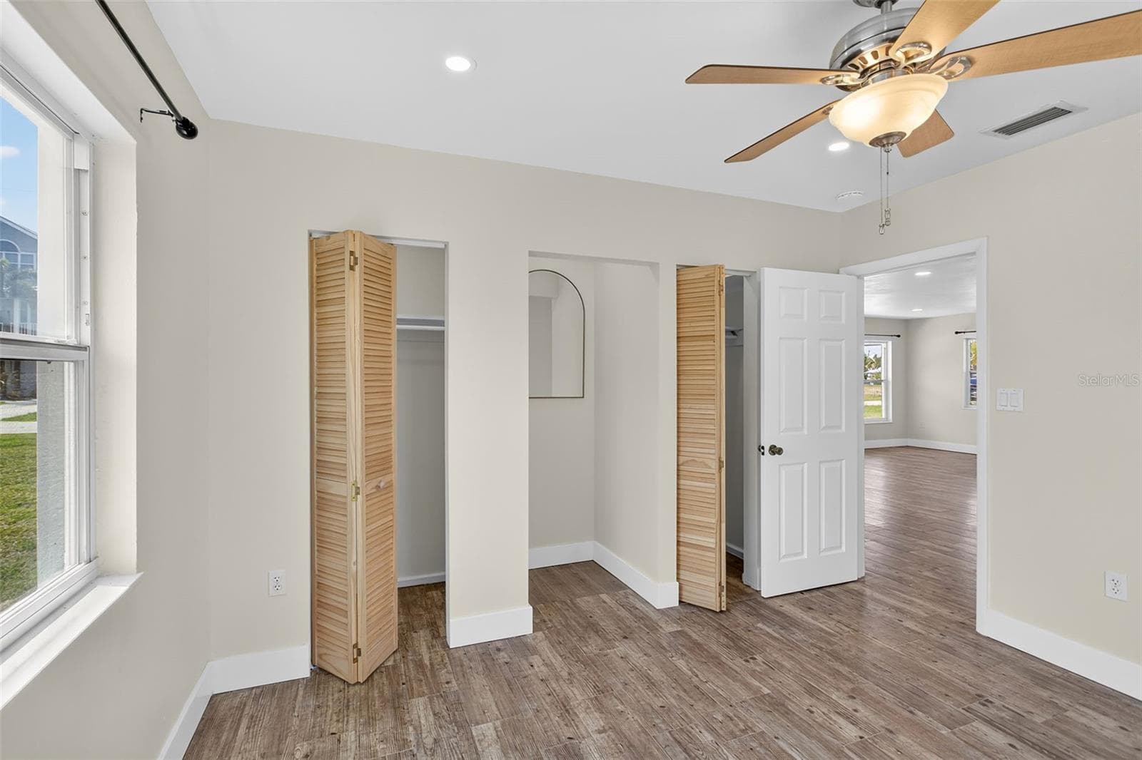 Primary bedroom with two closets and cove for dresser - 10451 MARION ST, ENGLEWOOD