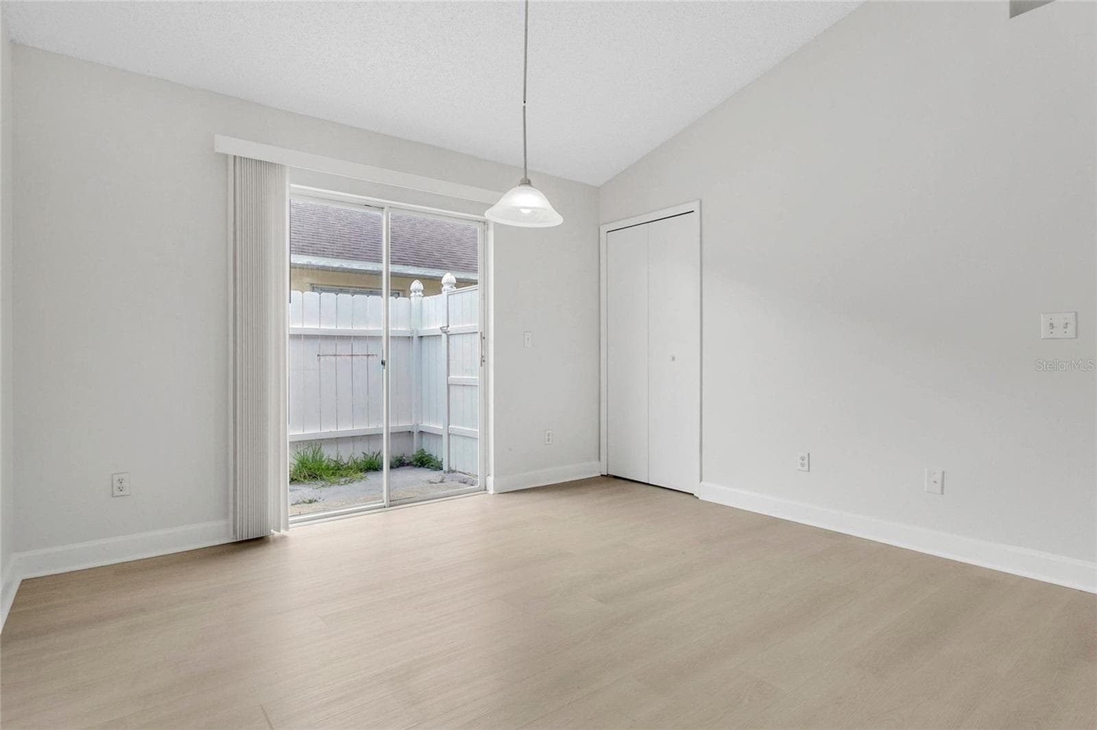Dining Room & Sliding Glass Door to Exterior - 9703 RED CLOVER AVE, ORLANDO