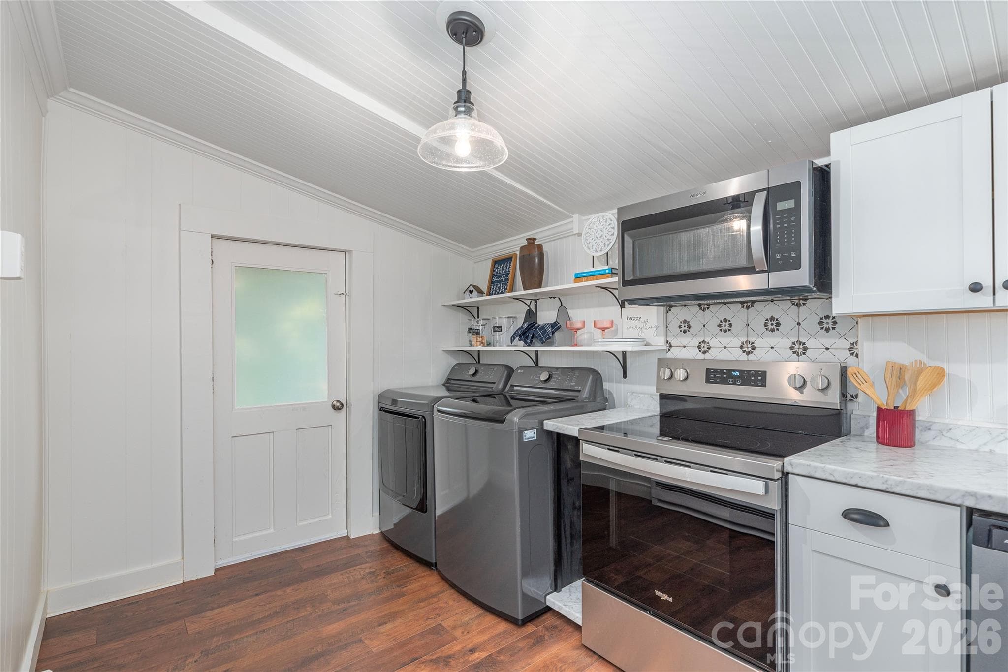 Functional kitchen layout with laundry conveniently located nearby. - Canton