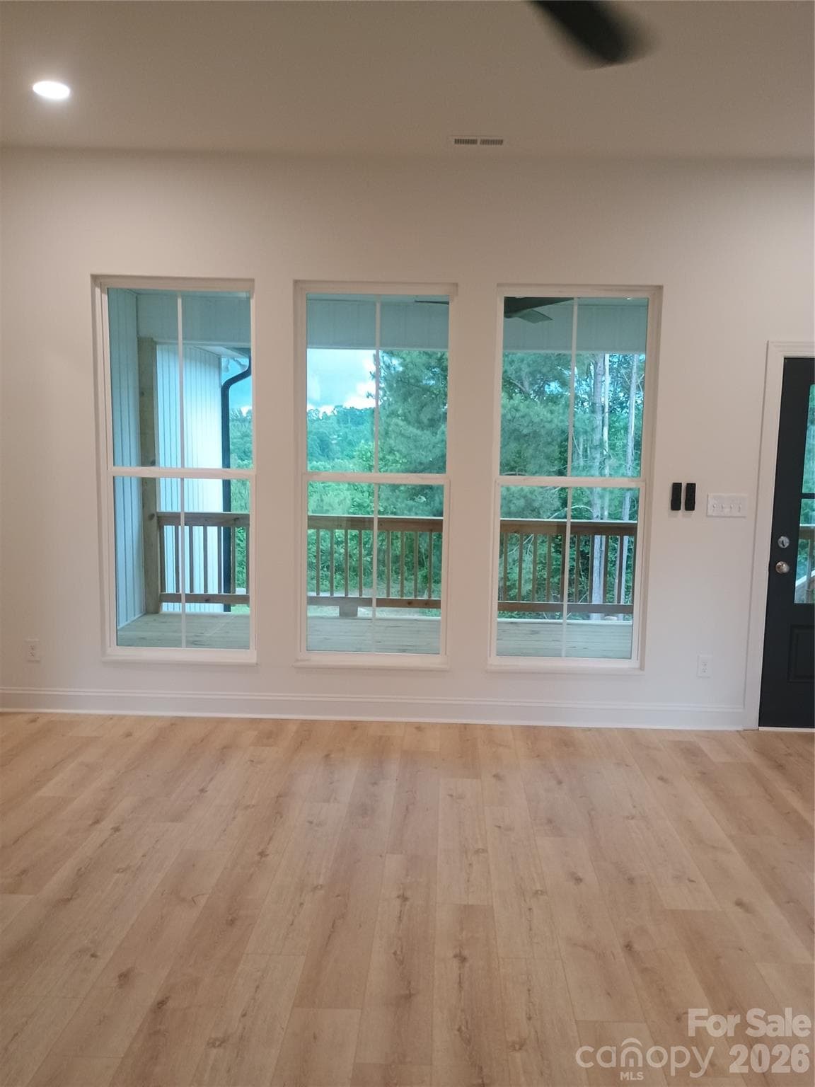LIVING ROOM WITH LOTS OF NATURAL LIGHT - Shelby