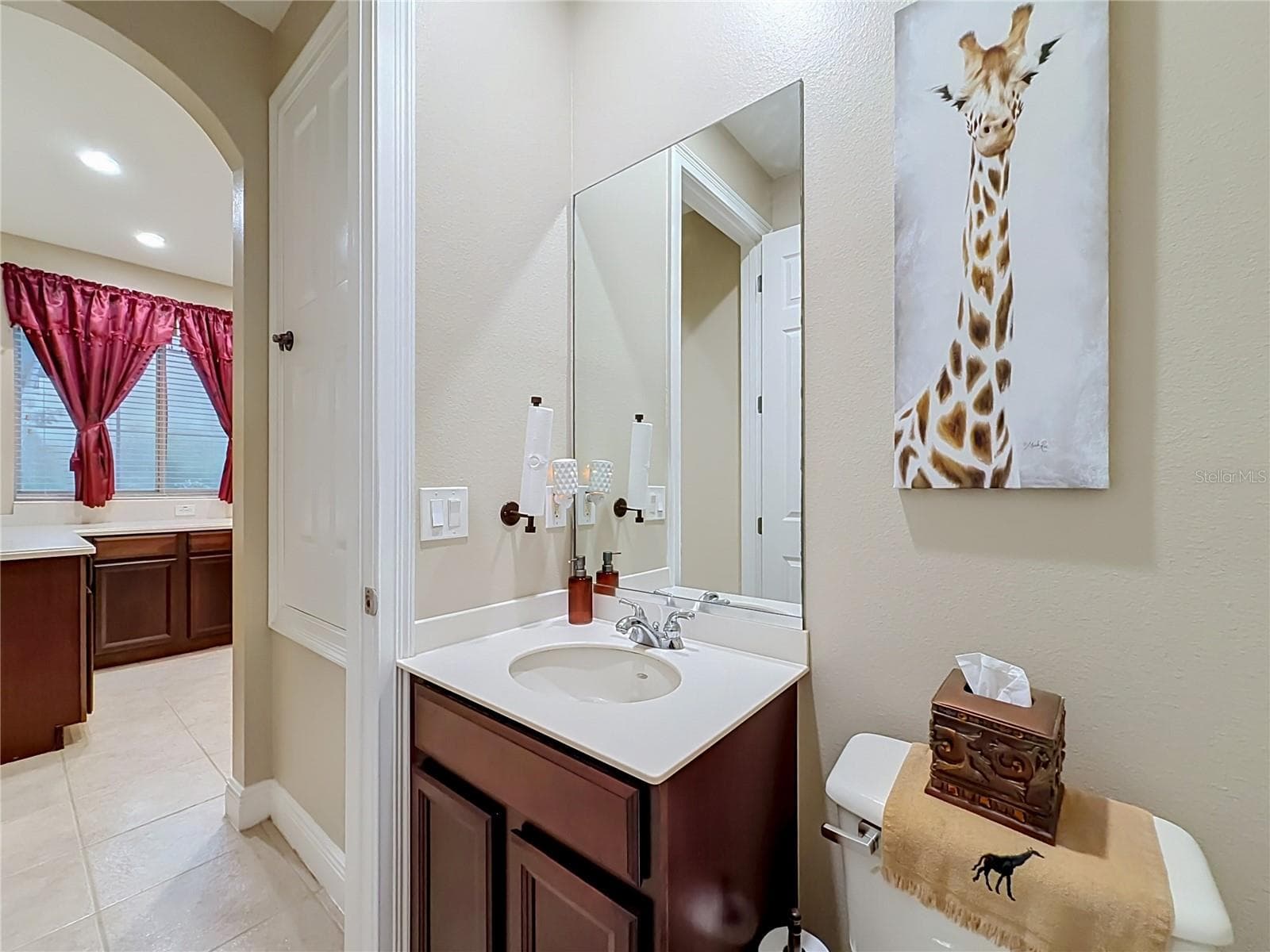 Downstairs 1/2 bath off wet bar area. - 3405 HEIRLOOM ROSE PL, OVIEDO