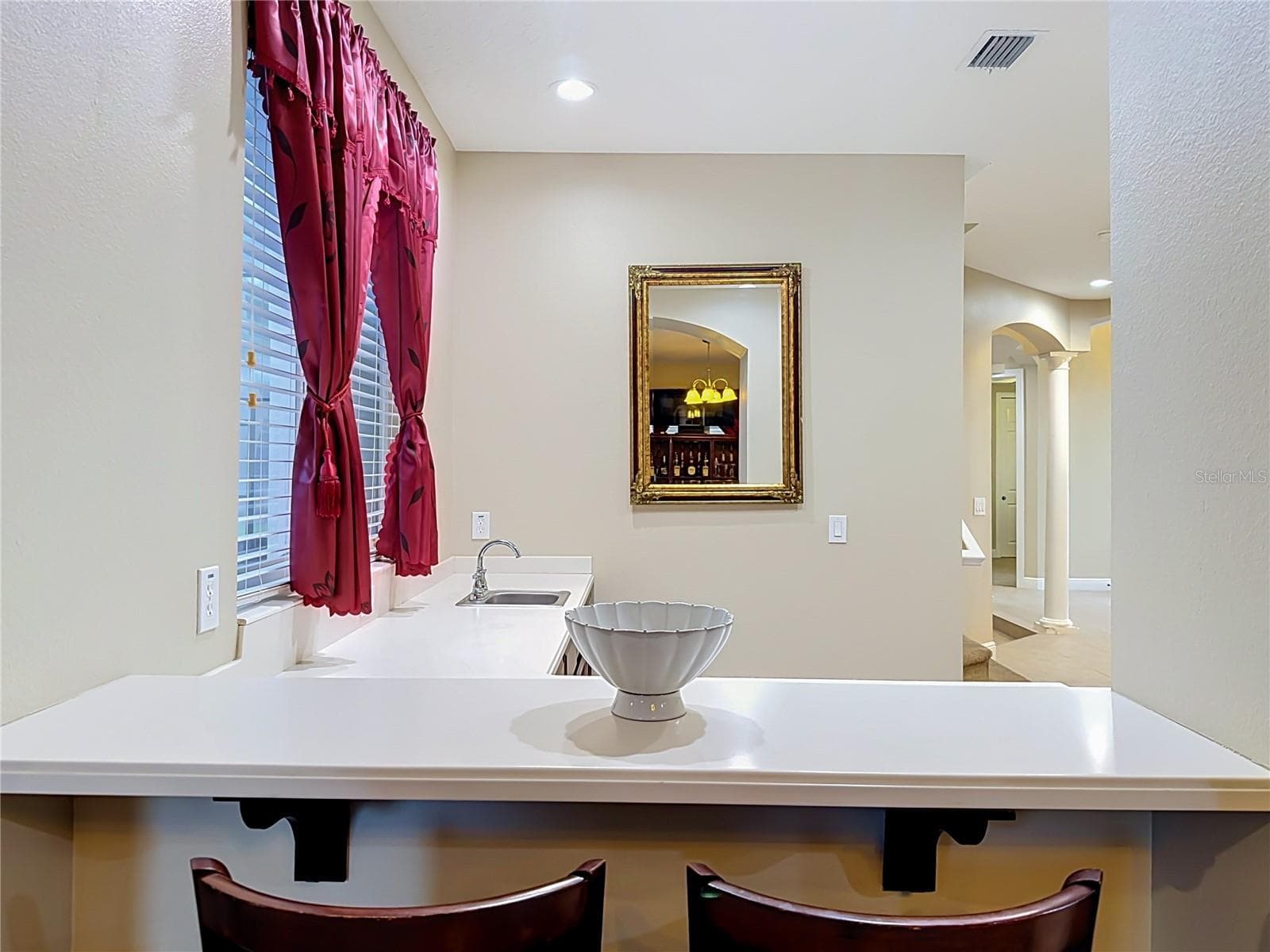 Additional bar seating off wet bar area. - 3405 HEIRLOOM ROSE PL, OVIEDO