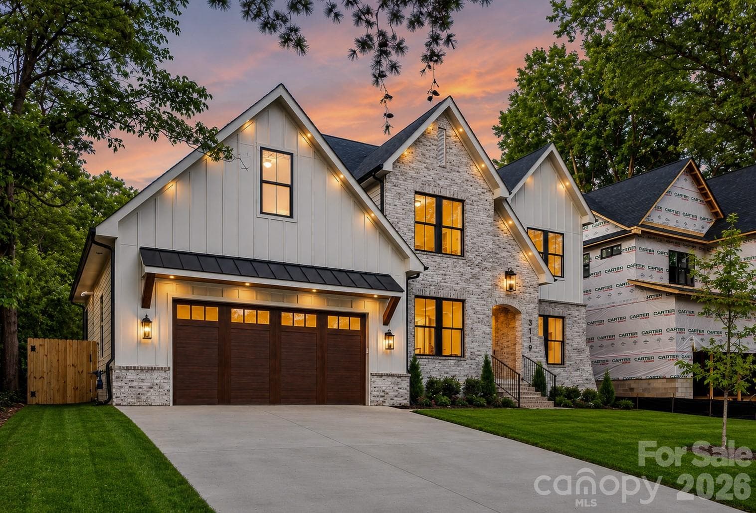 The exterior lighting is amazing! 2 Other new construction projects being built on this street and one tear down for sale...get in before prices soar! - Charlotte