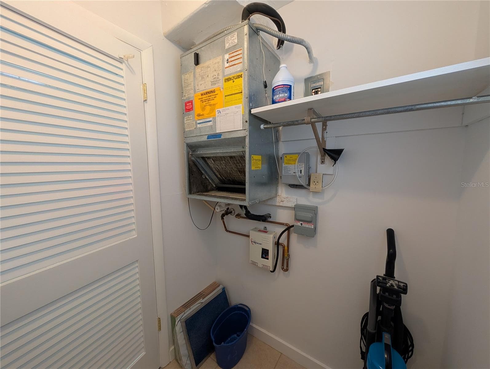 What a great place to install a washer and dryer, notice the hot water on demand. - 2008 CANAL DR #M3, BRADENTON