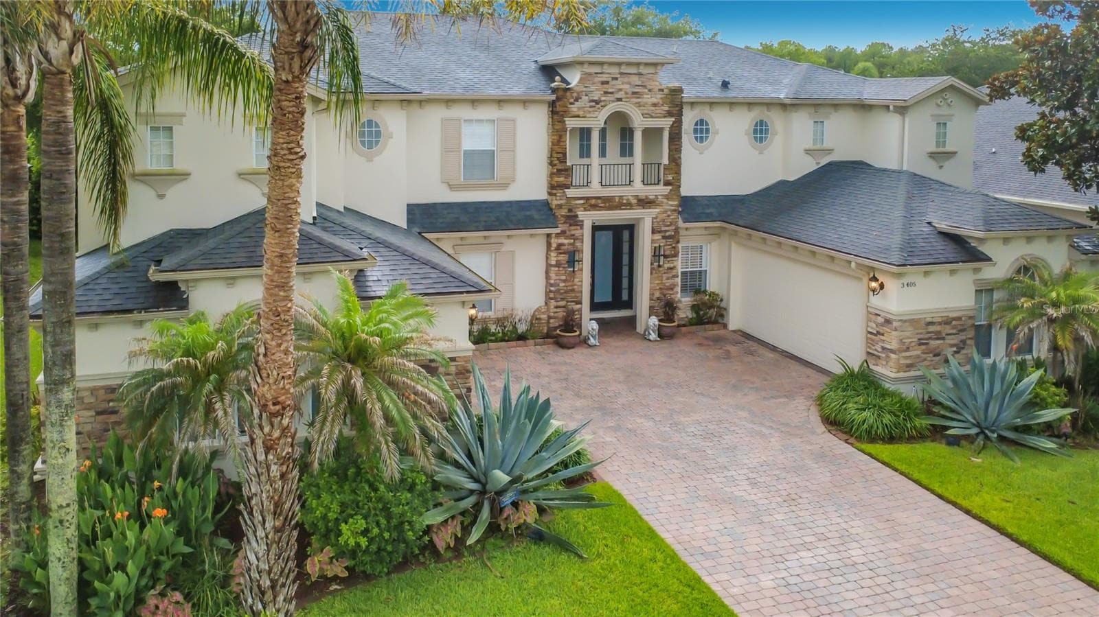 Beautifully landscaped and well maintained. - 3405 HEIRLOOM ROSE PL, OVIEDO