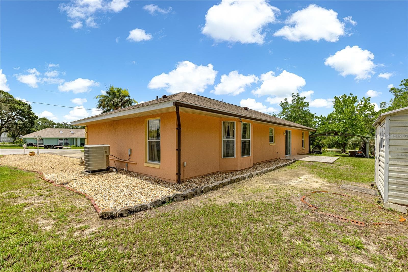 side/ backyard view - 4 CEDAR TRACE PASS, OCALA