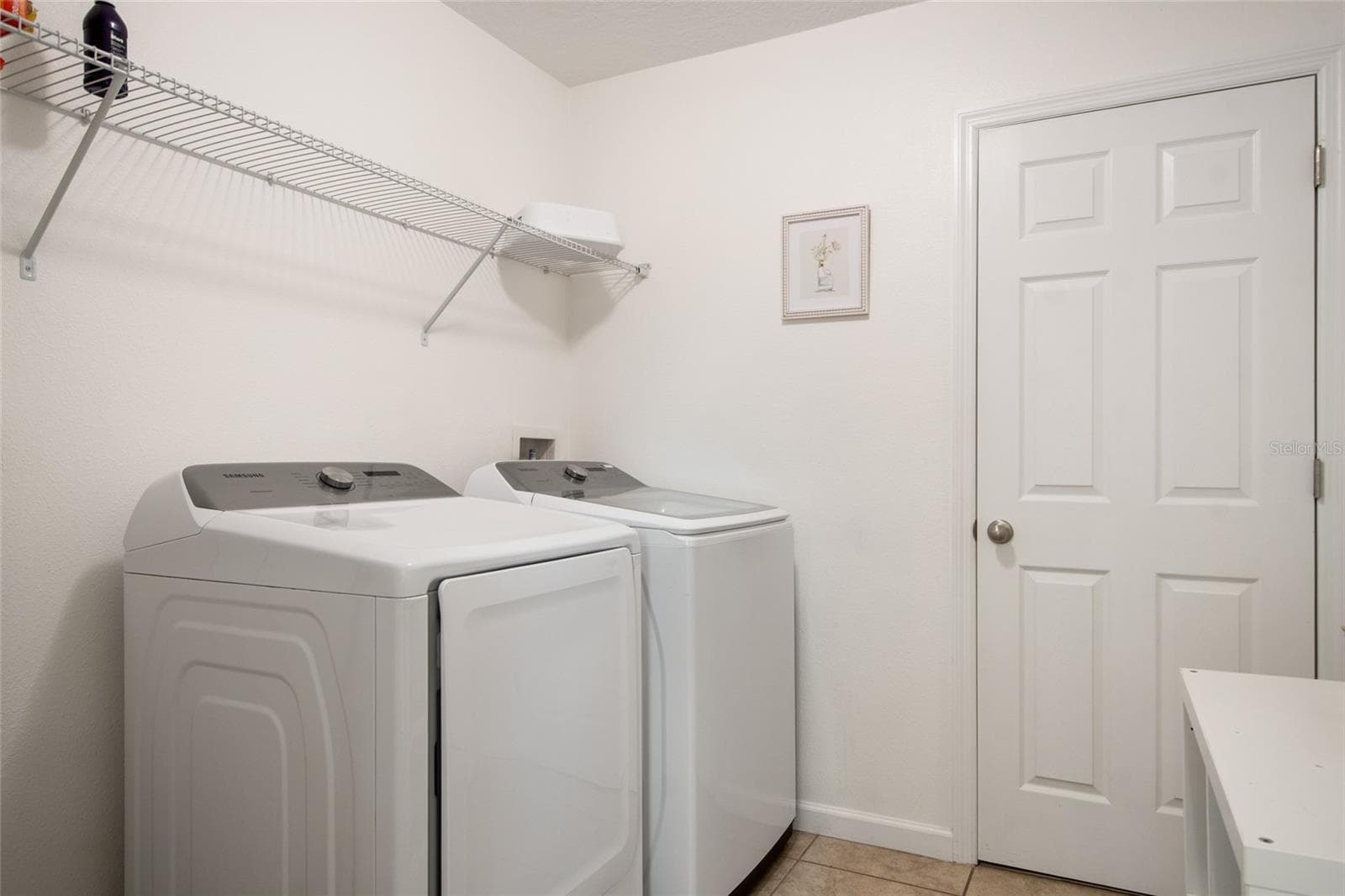 Upstairs Walk In Laundry Room with Extra Closet - 1659 GENTLE BREEZE DR, ST CLOUD
