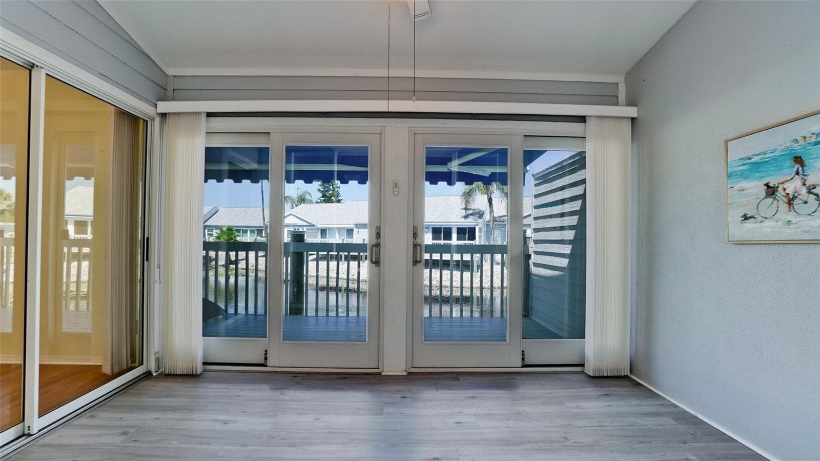 NEW IMPACT RESISTANT SLIDERS LEADING TO LANAI - 506 WOODSTORK CIR, BRADENTON