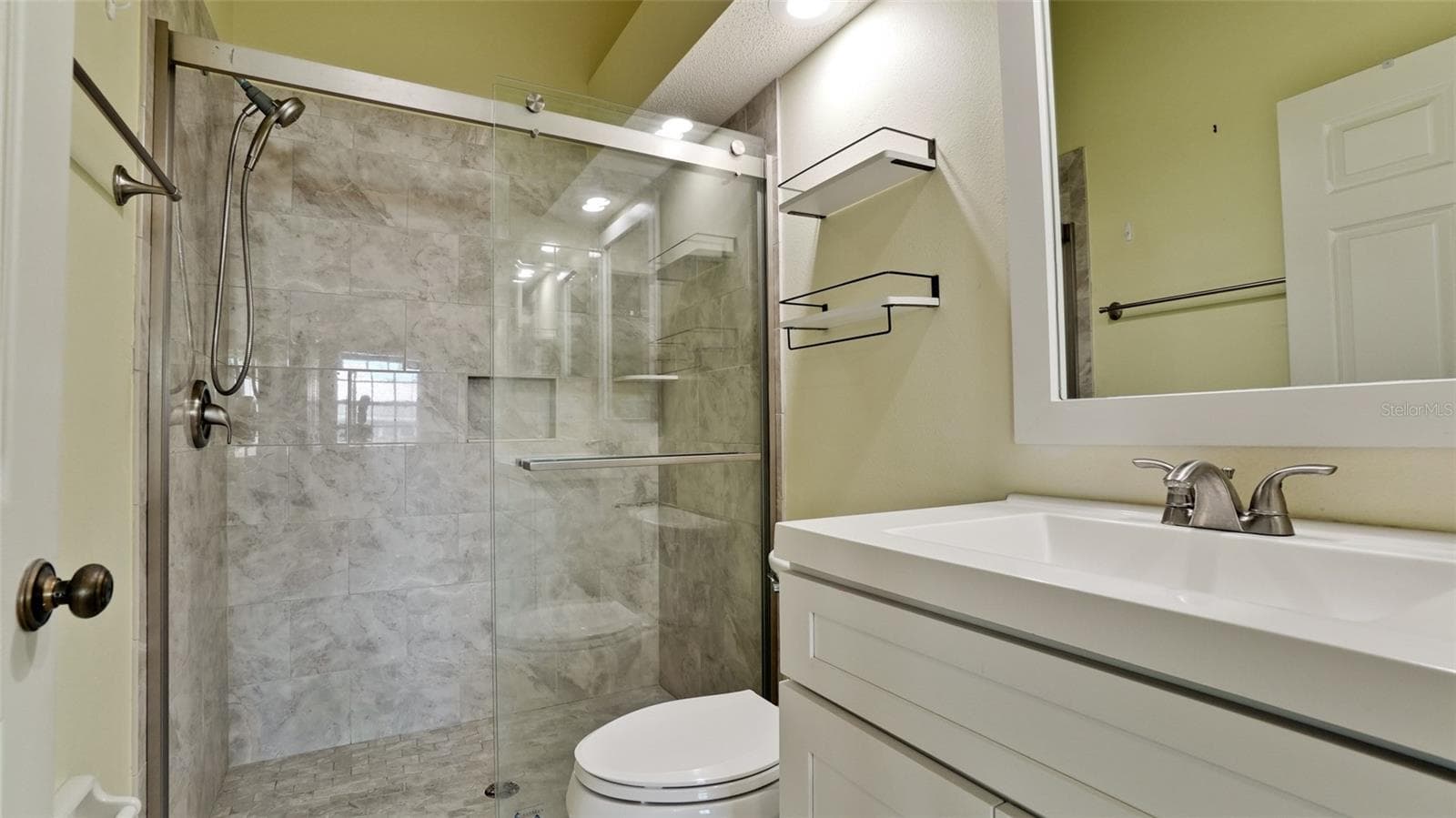 TOTALLY UPDATED MASTER BATH - 506 WOODSTORK CIR, BRADENTON