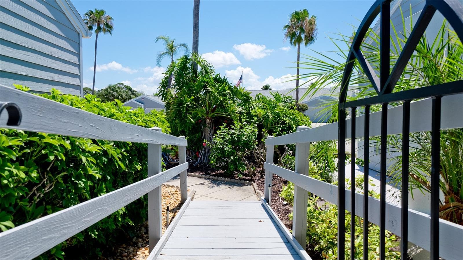 RAMP FROM DRIVEWAY TO FRONT DOOR OF VILLA - 506 WOODSTORK CIR, BRADENTON