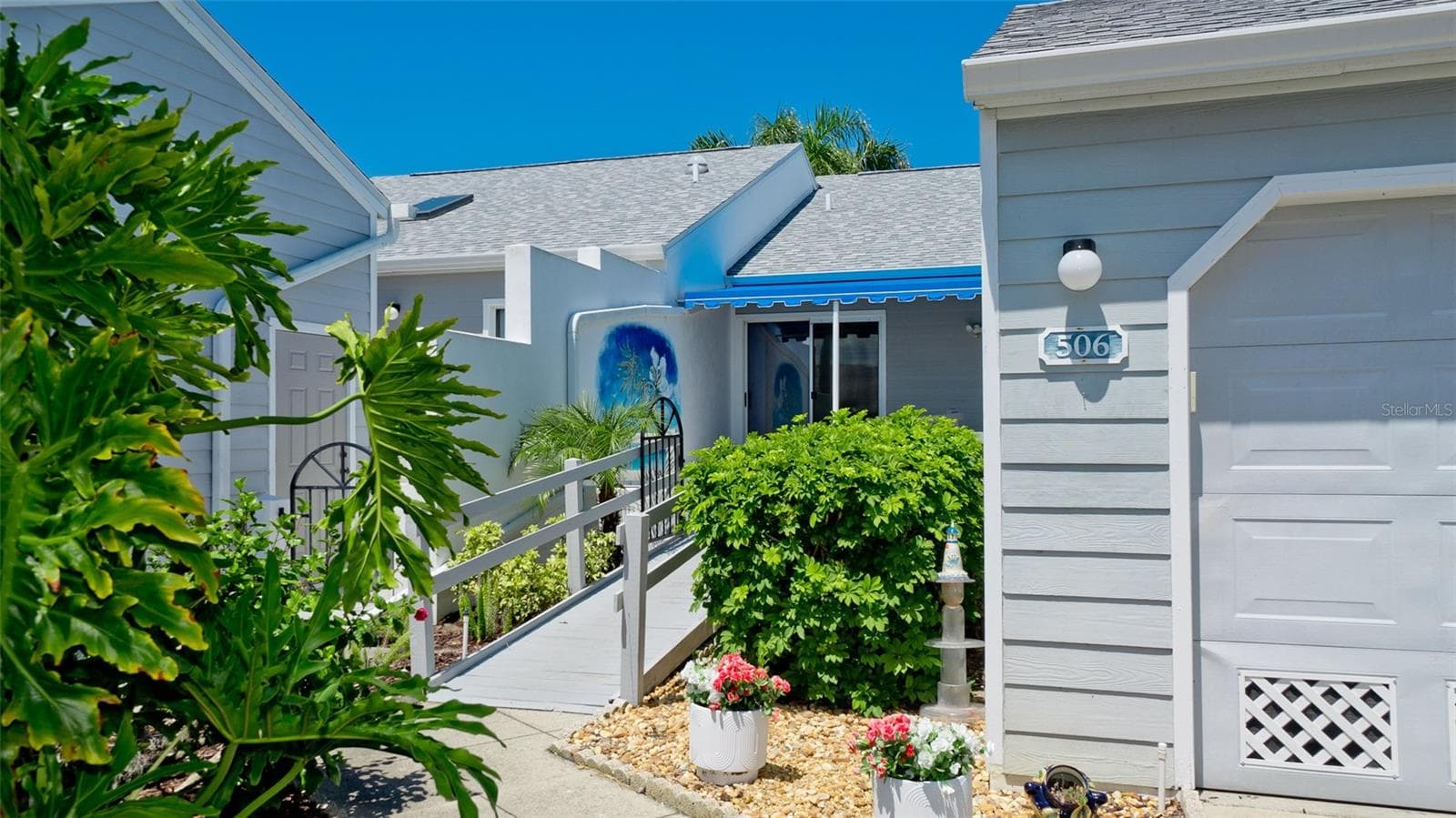 MAIN ENTRANCE WITH WHEELCHAIR RAMP - 506 WOODSTORK CIR, BRADENTON