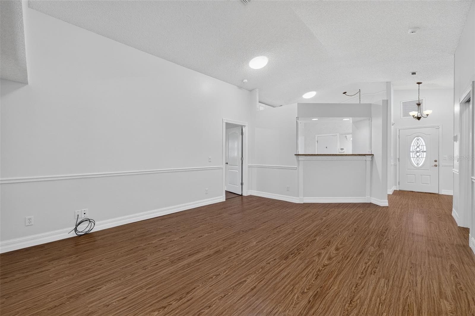 Living Room with Vaulted Ceilings - 4431 FERN DR, BRADENTON