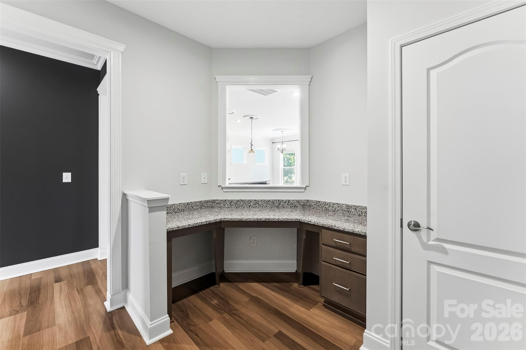 View of the desk area with opening into the kitchen/great room so that you can work without interuption. - 1318 Poppy Way, Matthews