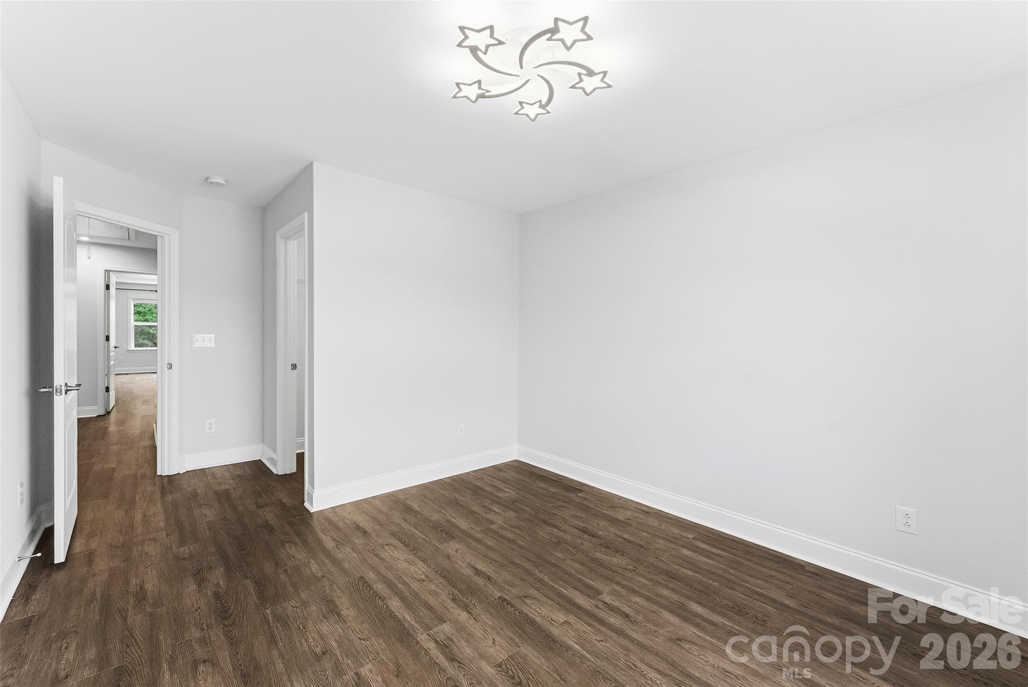 Bedroom 3 freshly painted, no carpeting, walk in closet with built in's - 1318 Poppy Way, Matthews