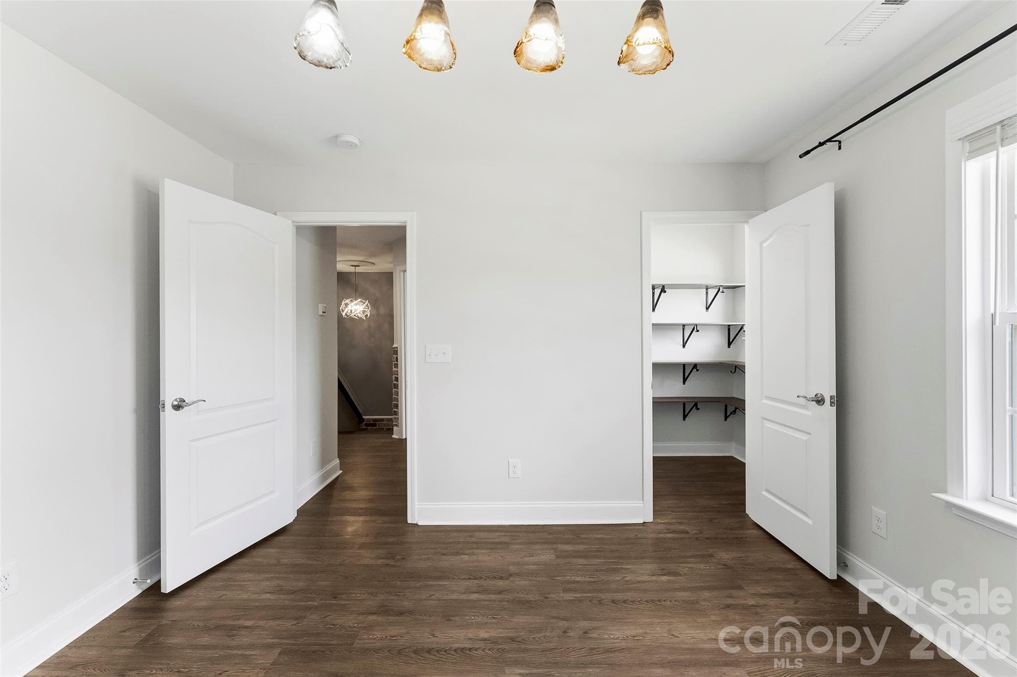 Another view of bedroom 4 with walk in closet. - 1318 Poppy Way, Matthews