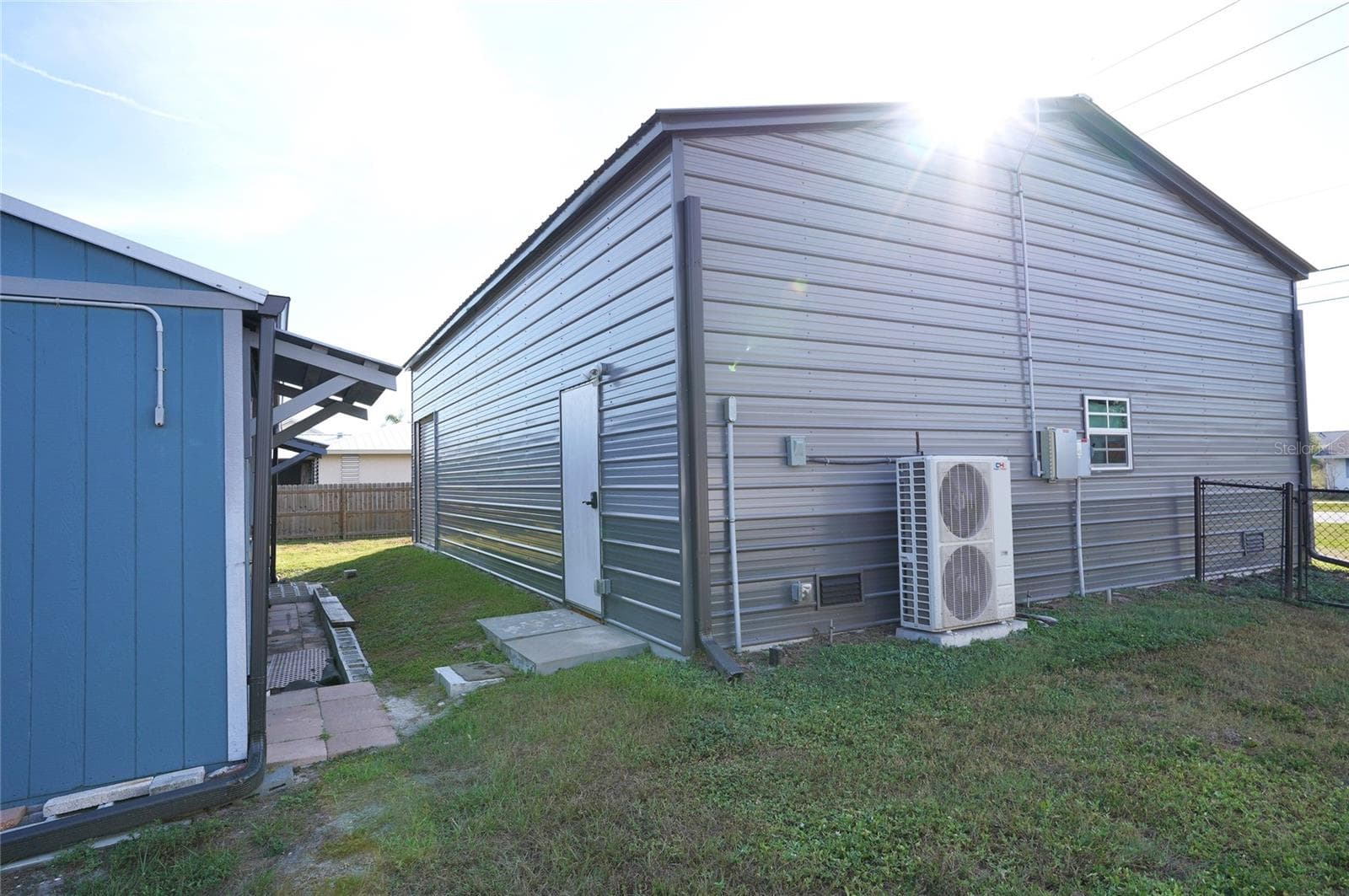 30 x 40 with two Acs units.  12' plus on the inside. - 19891 MIDWAY BLVD, PORT CHARLOTTE