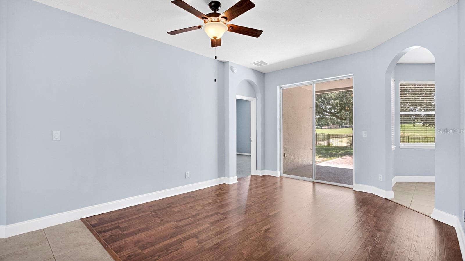 View to primary Bedroom and back patio from Dining area. - 34037 FORTUNADO ST, SORRENTO