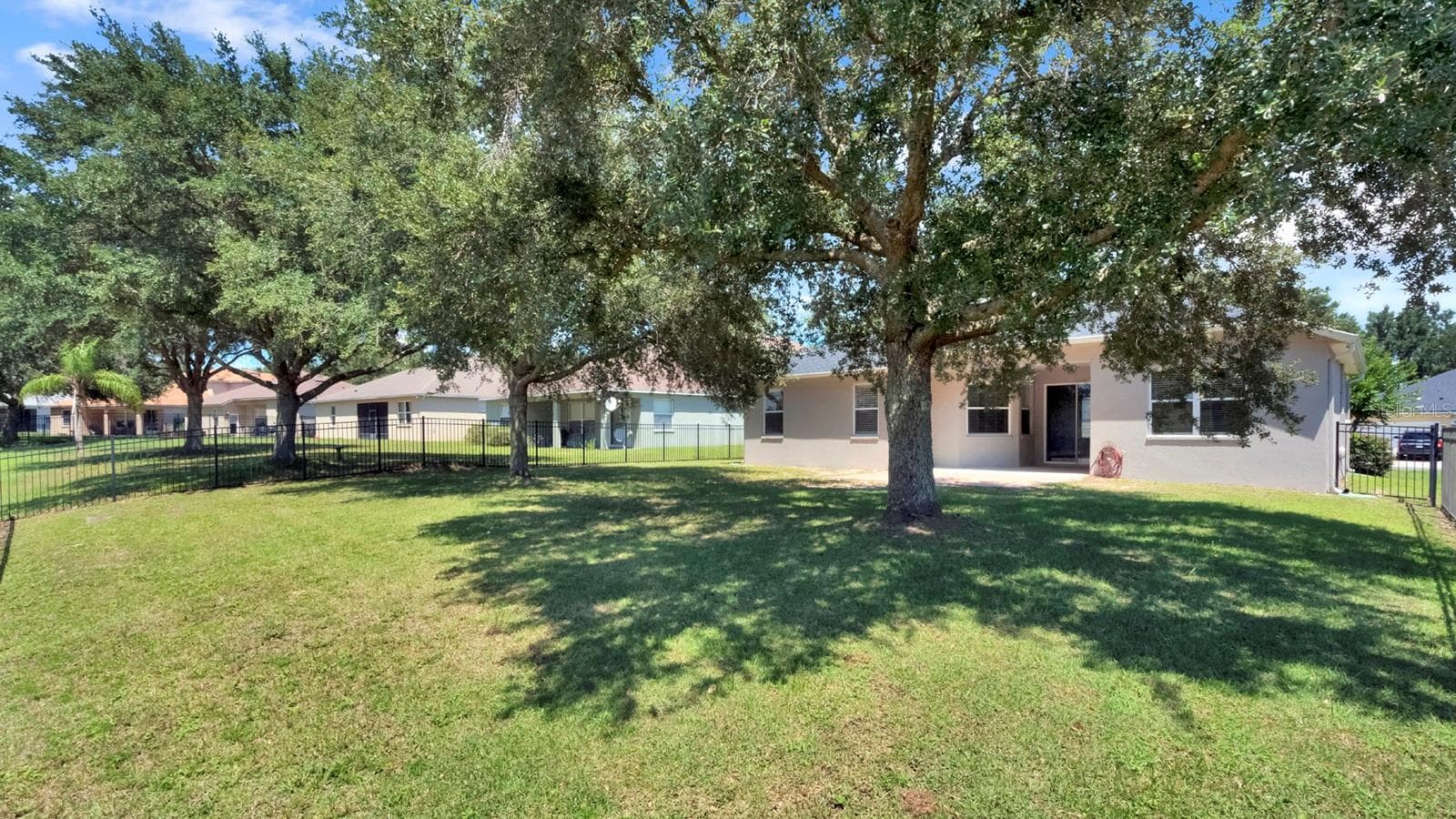 View to the back of the home from the corner of the lot. - 34037 FORTUNADO ST, SORRENTO