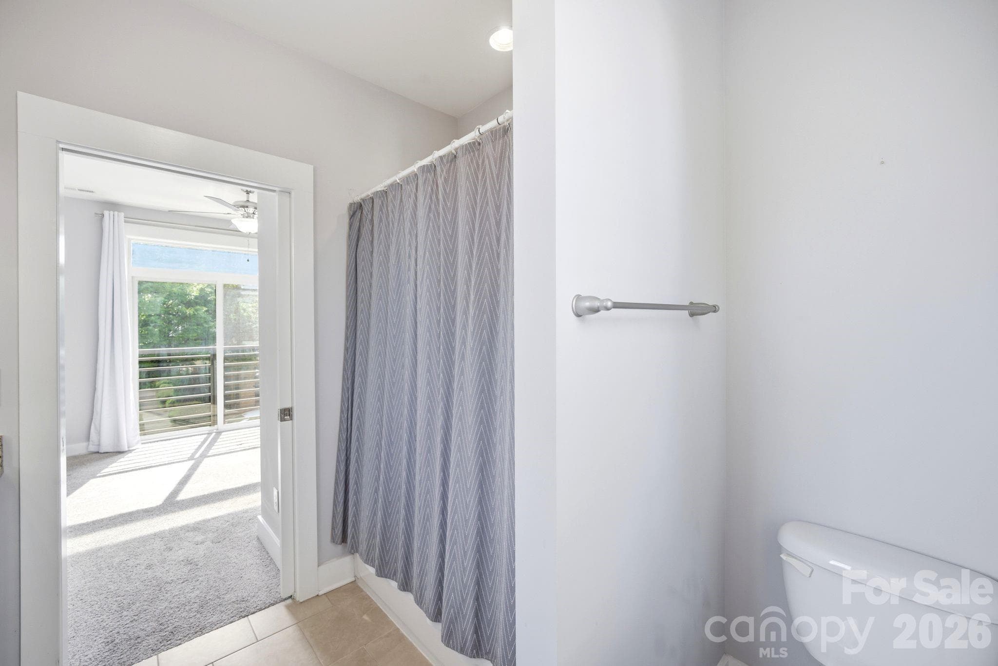 2nd (primary) bedroom en-suite full bath with shower/tub. - 923 Warren Burgess Lane, Charlotte