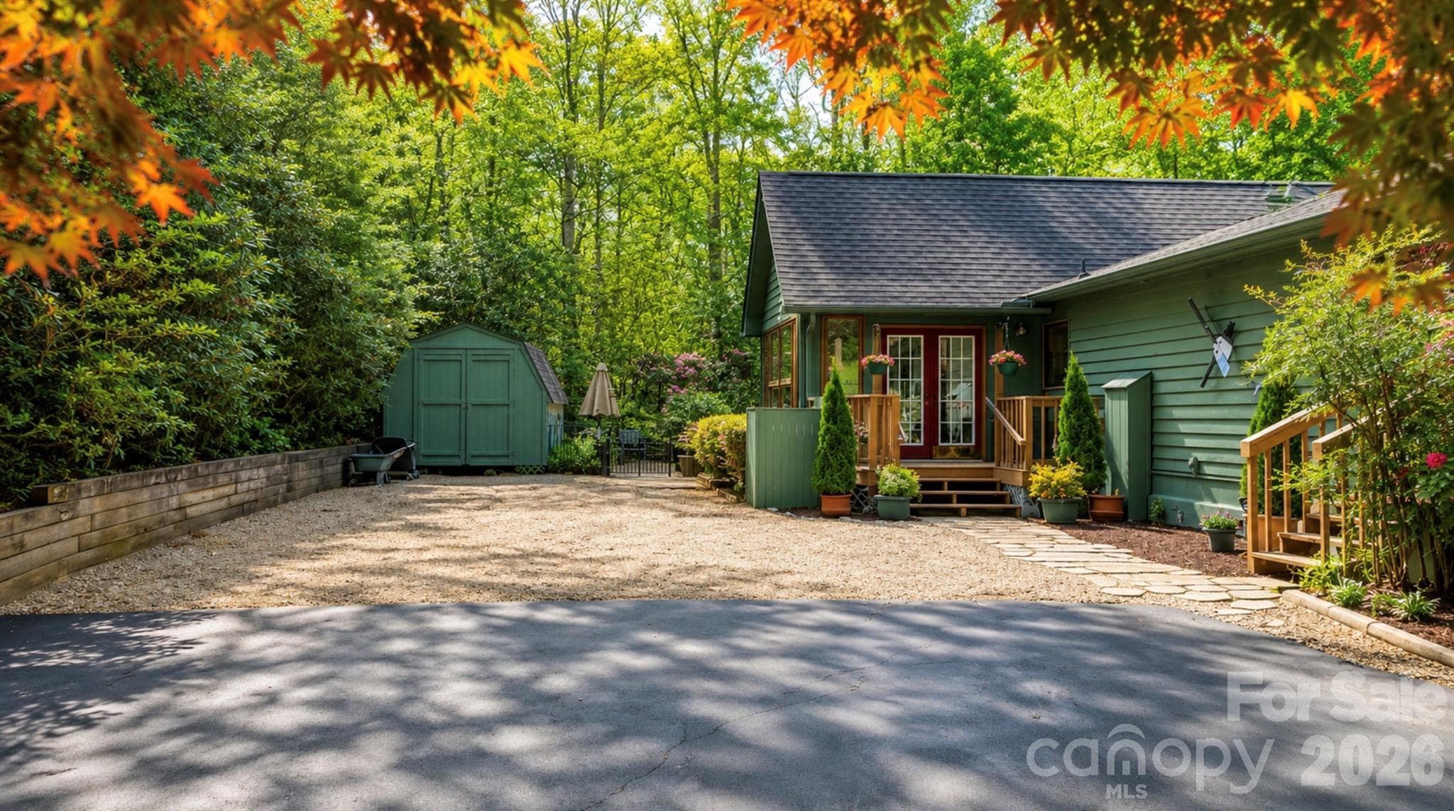 The large, level parking area leads directly to the backyard oasis, or the all season sunroom - Brevard