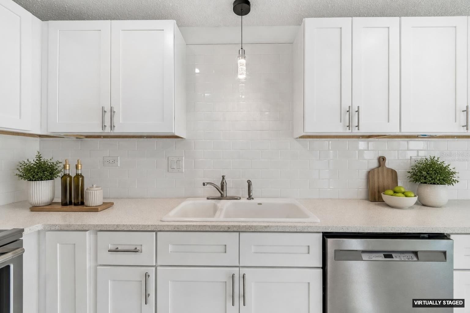 VIRTUALLY STAGED KITCHEN AREA - 450 TREASURE ISLAND CSWY #106, TREASURE ISLAND