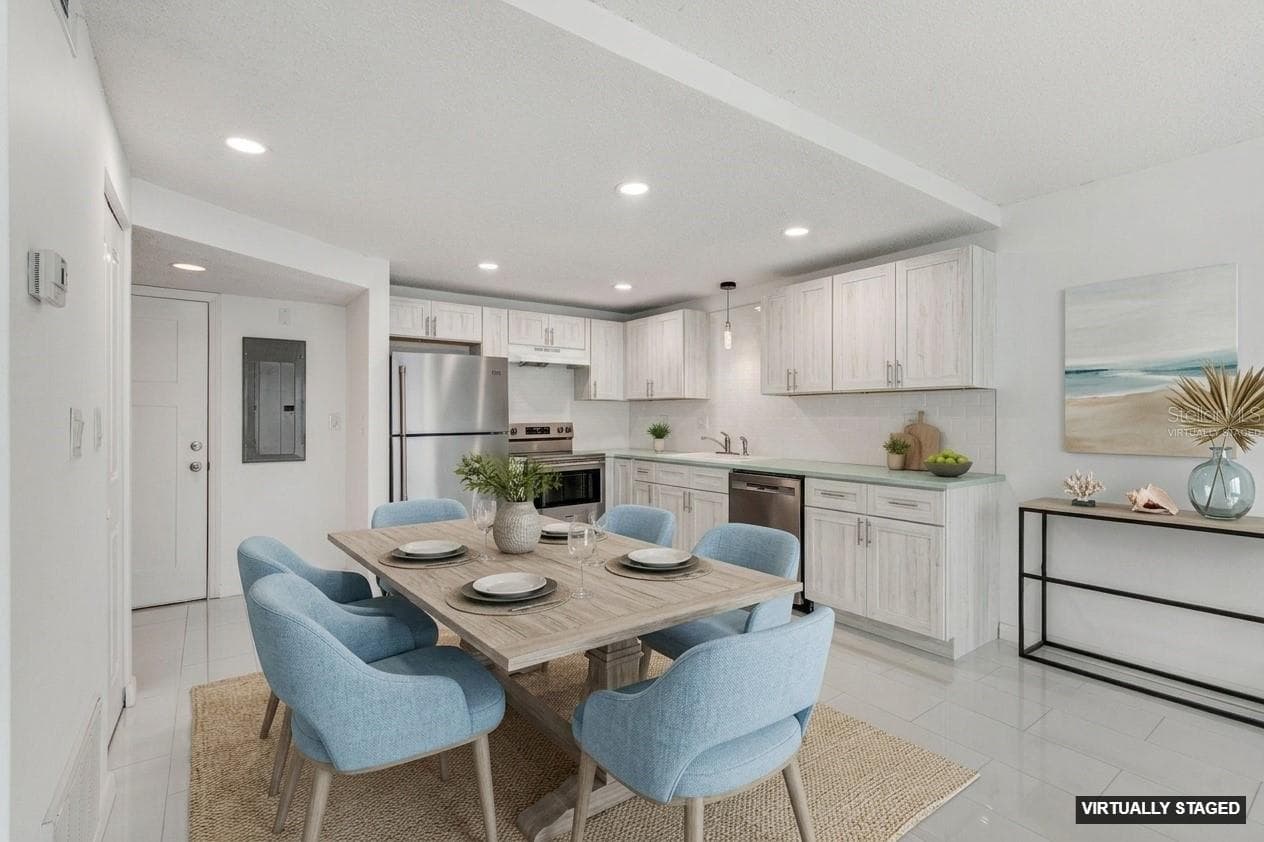VIRTUALLY STAGED DINING/LIVING AREA - 450 TREASURE ISLAND CSWY #106, TREASURE ISLAND