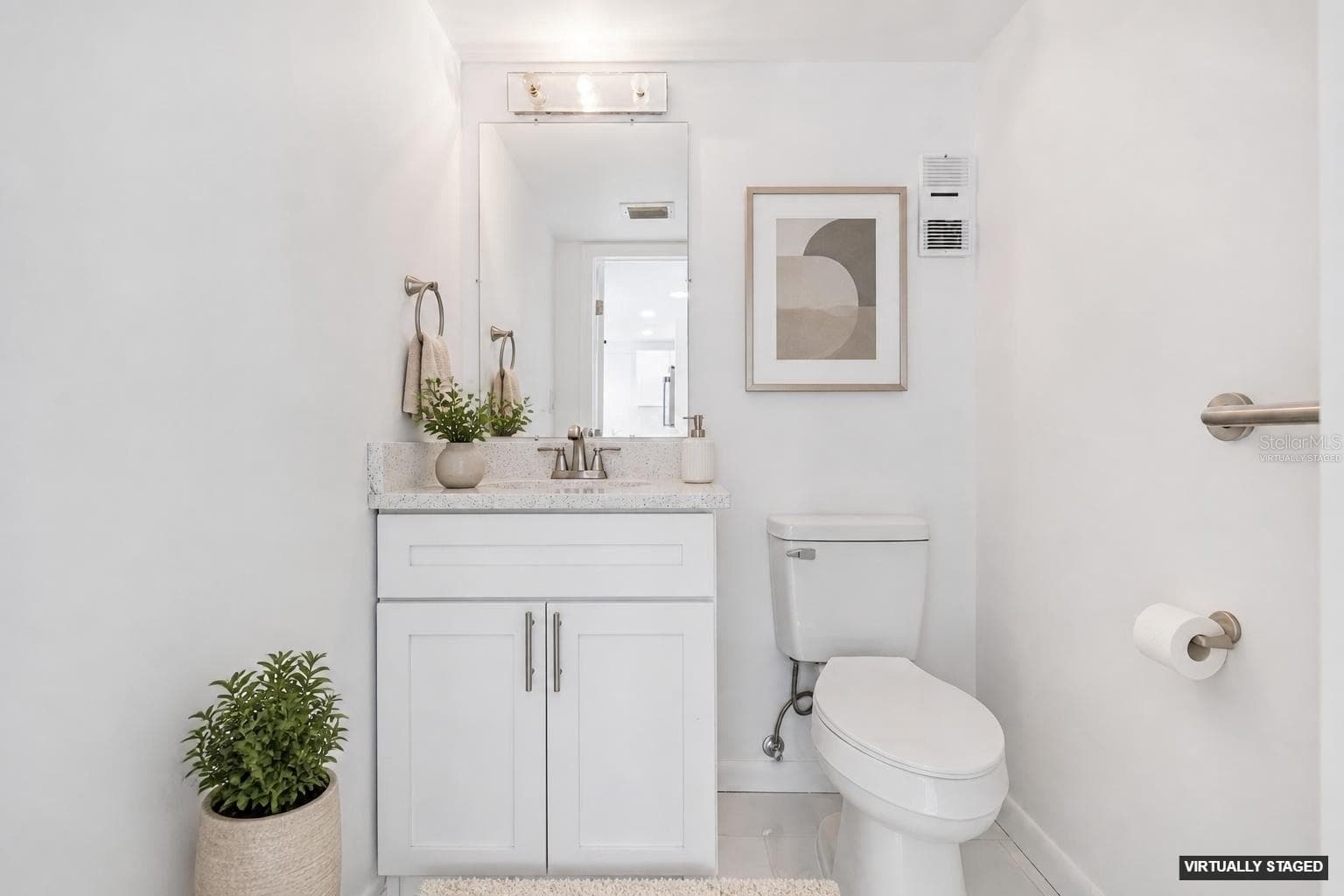 VIRTUALLY STAGED 1/2 BATH - 450 TREASURE ISLAND CSWY #106, TREASURE ISLAND